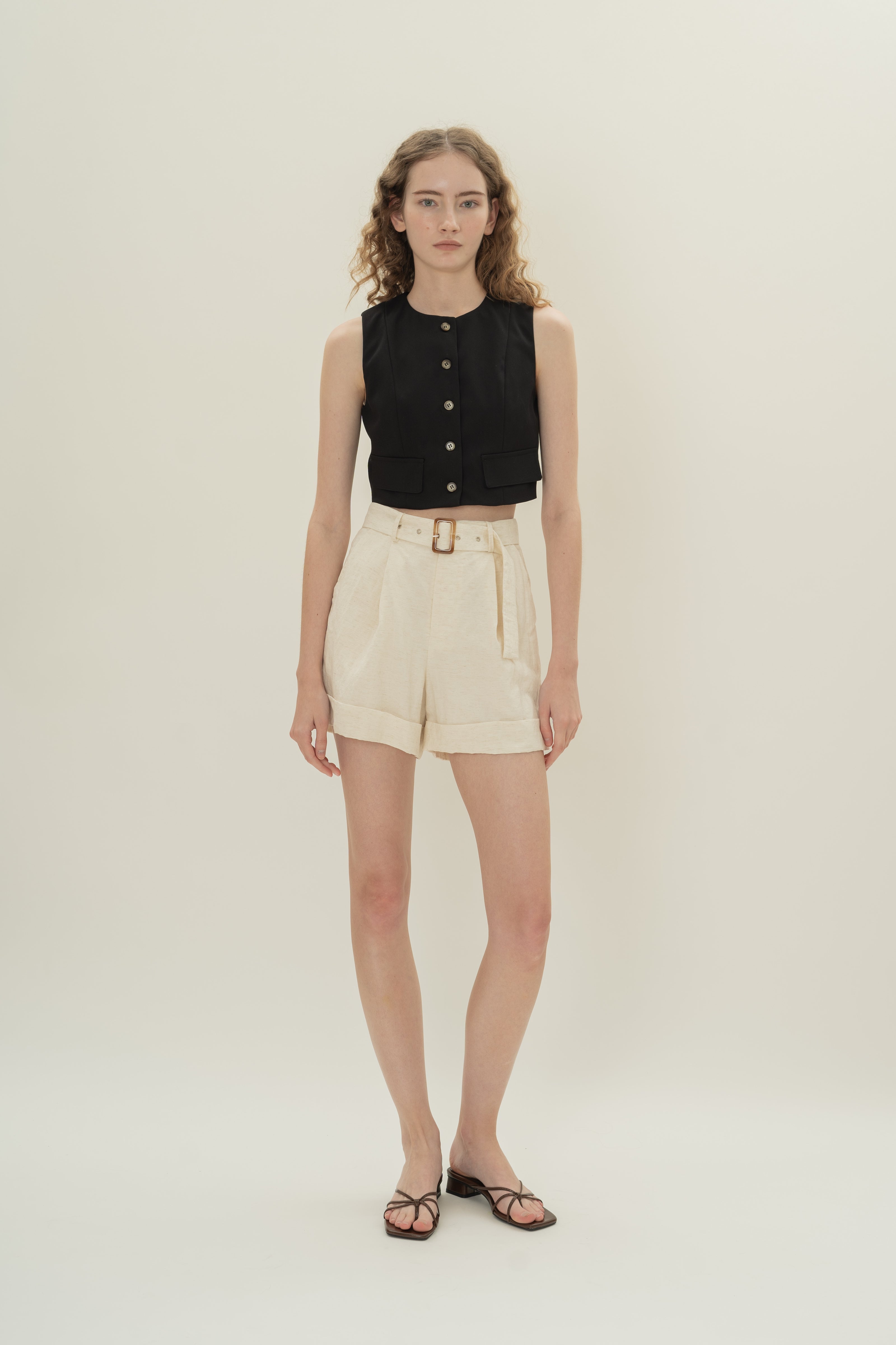 Collarless Sleeveless Top in Black