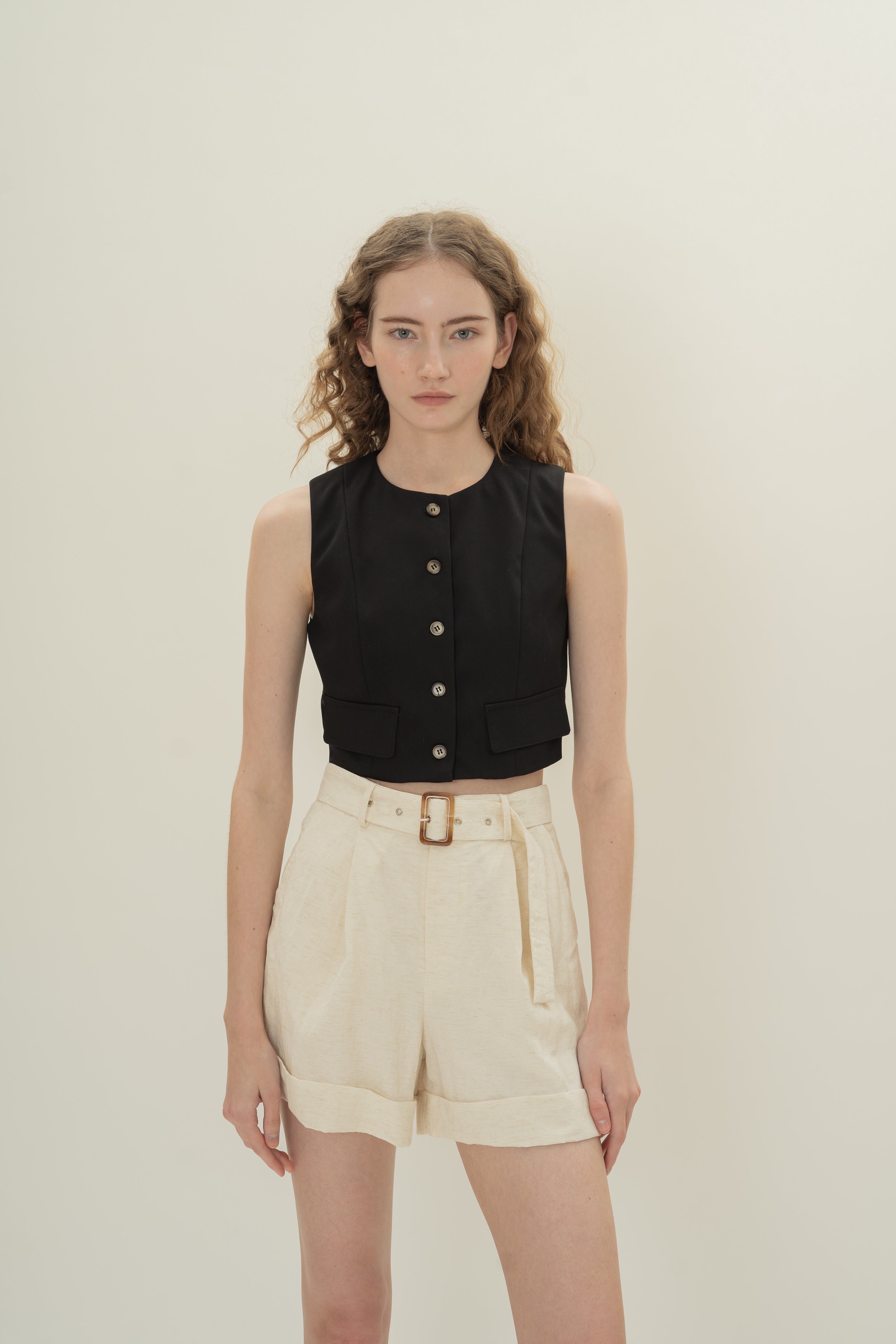 Collarless Sleeveless Top in Black