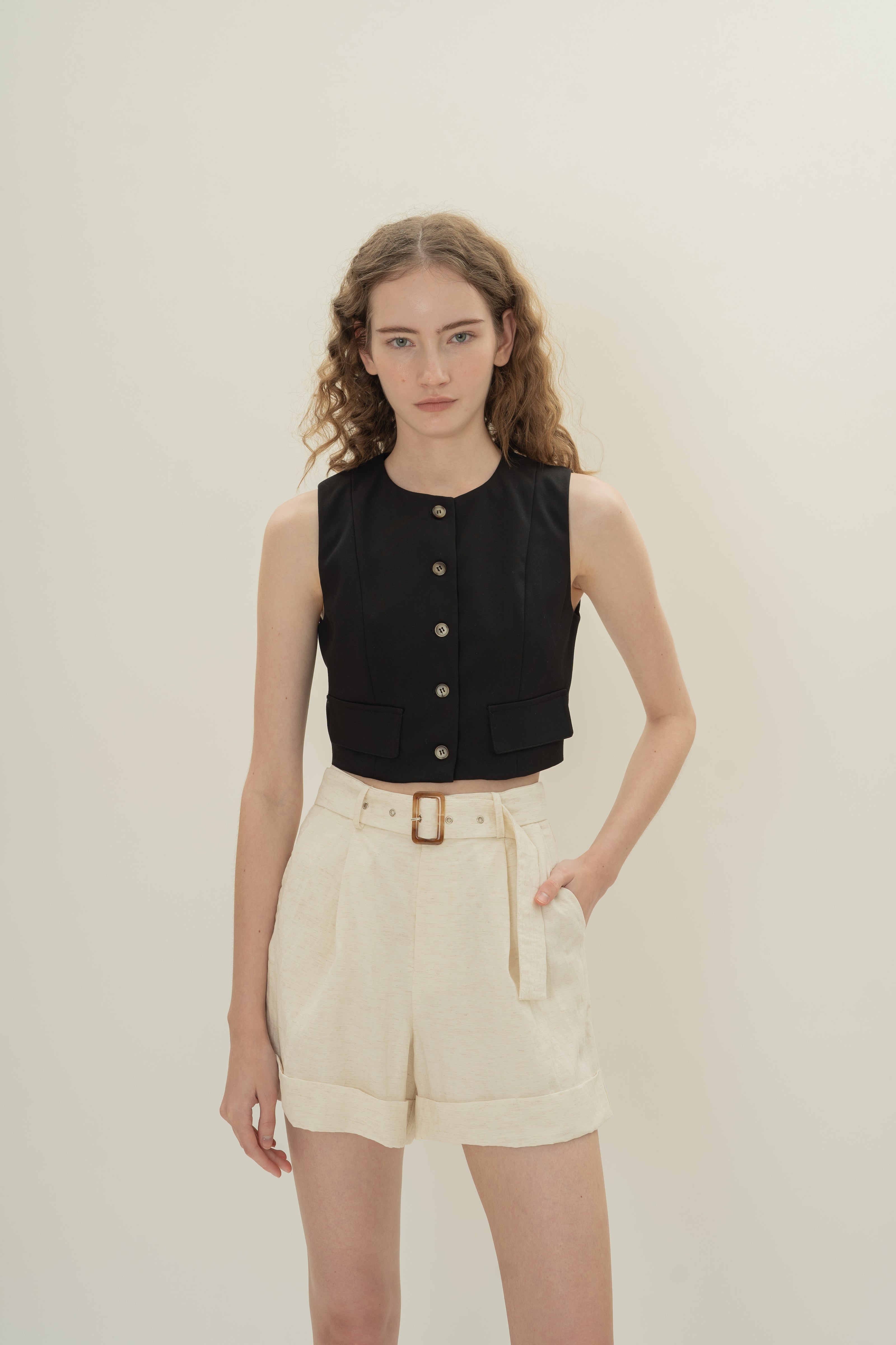 Collarless Sleeveless Top in Black