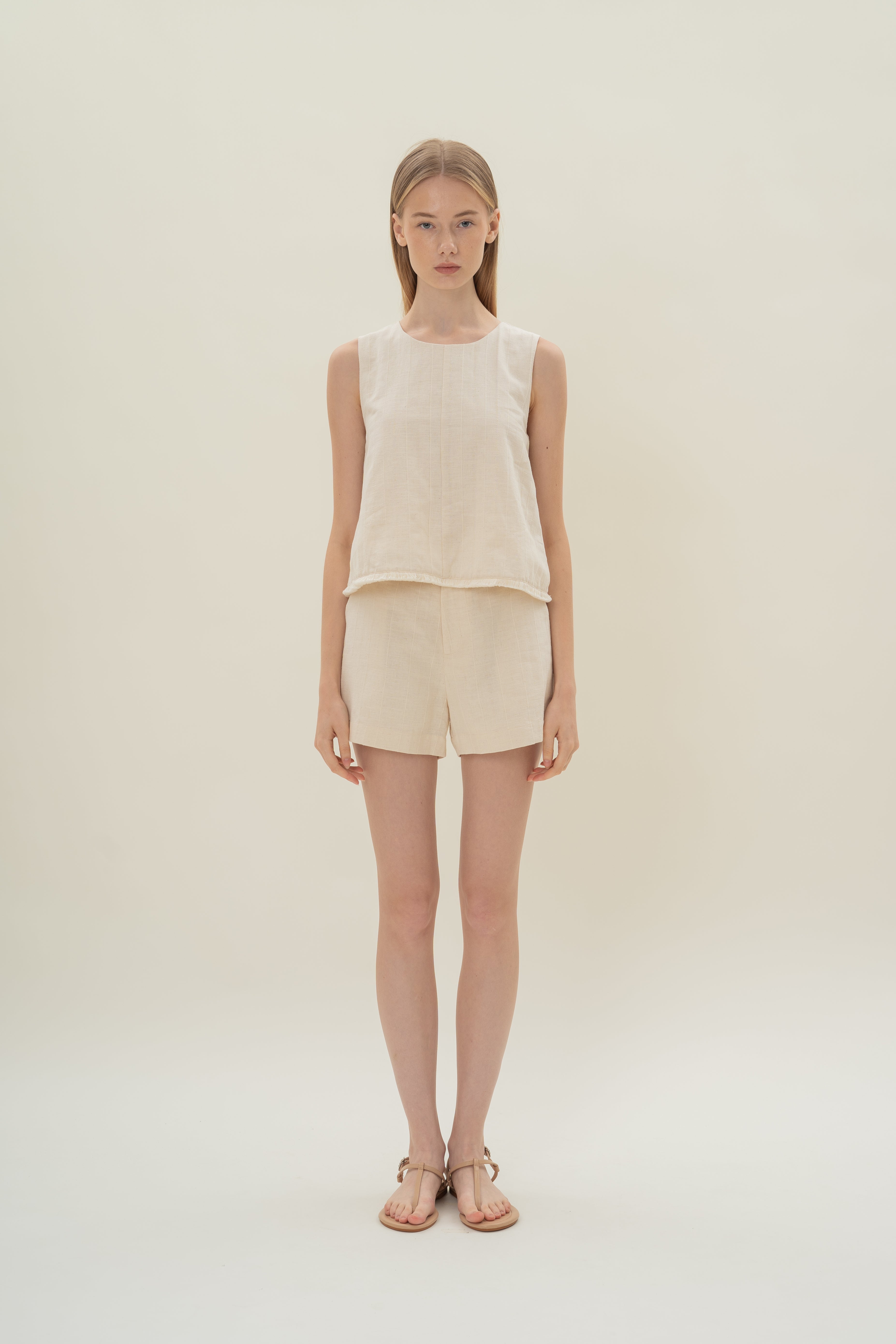 Frilled Hem Sleeveless A-Line Top in Natural