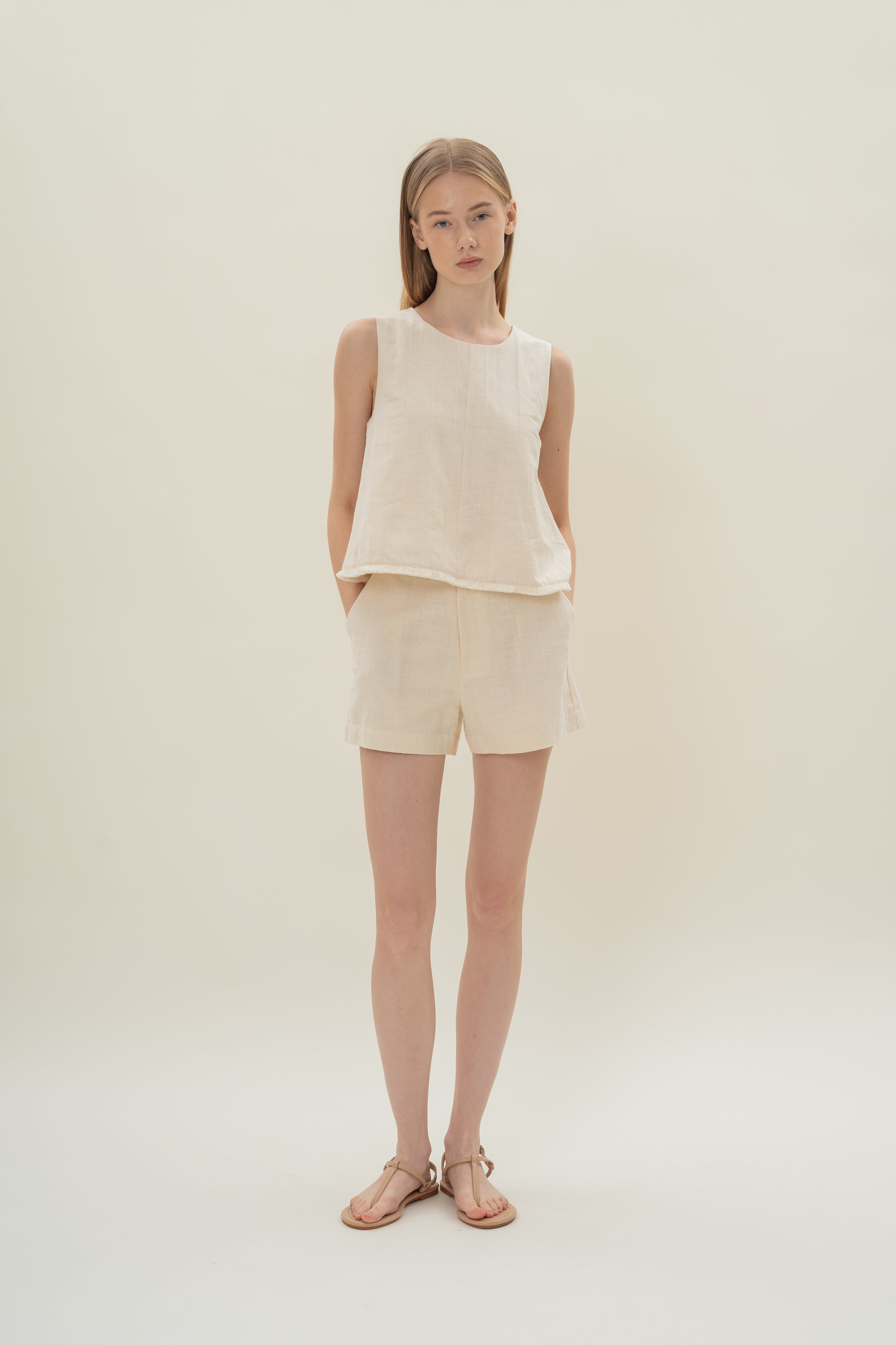 Frilled Hem Sleeveless A-Line Top in Natural