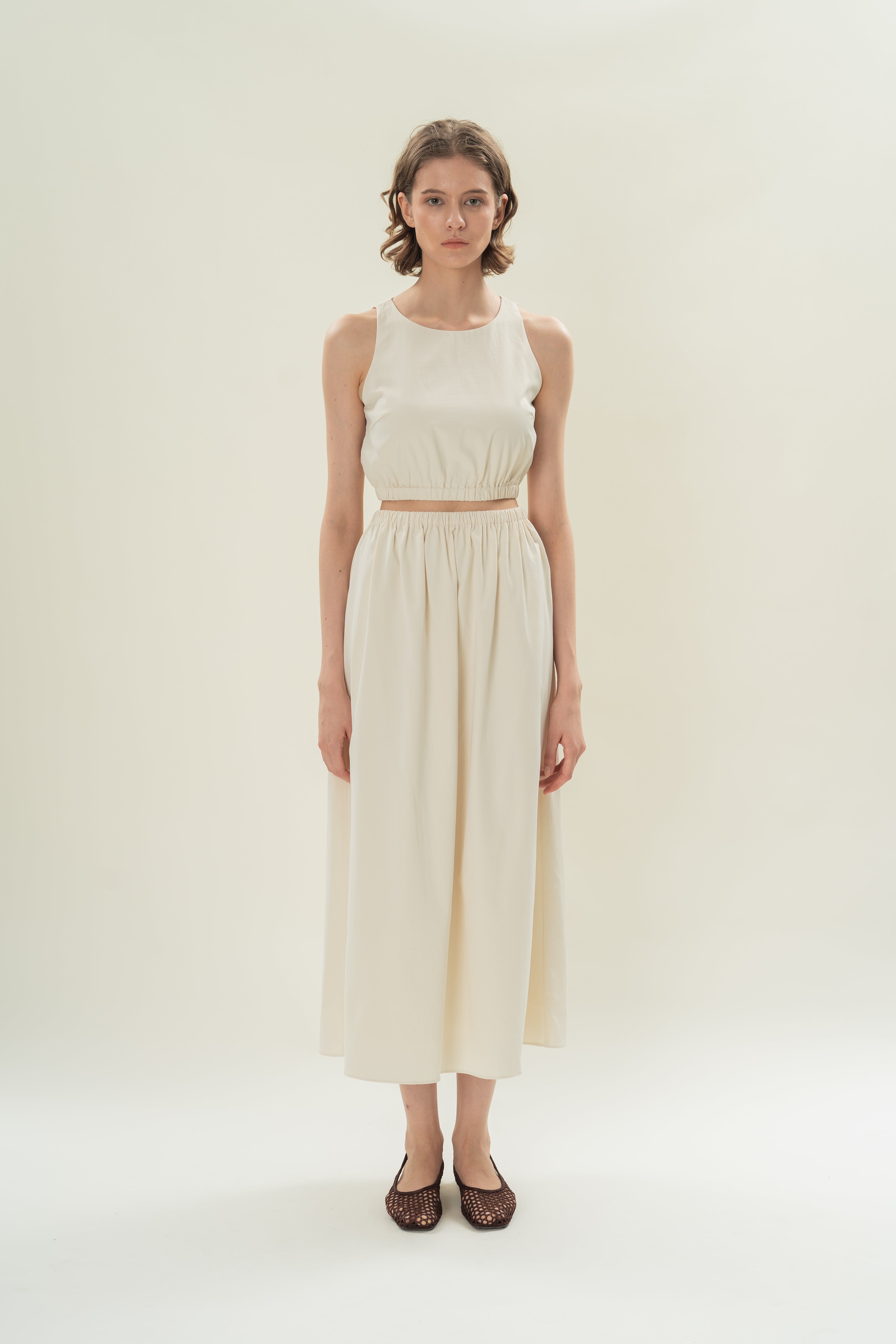 Sleeveless Cropped Gathered Waist Top in Natural