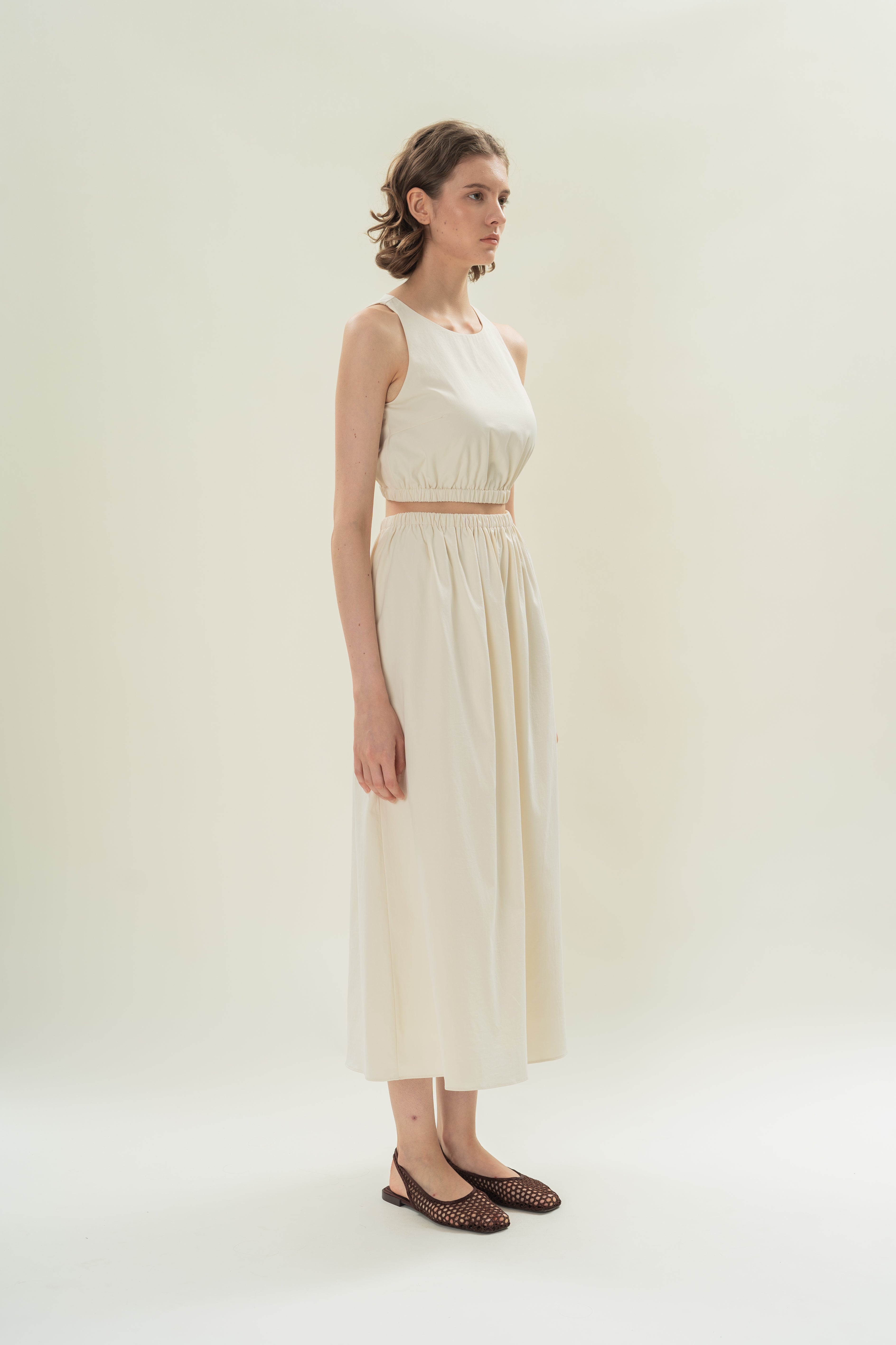 Sleeveless Cropped Gathered Waist Top in Natural