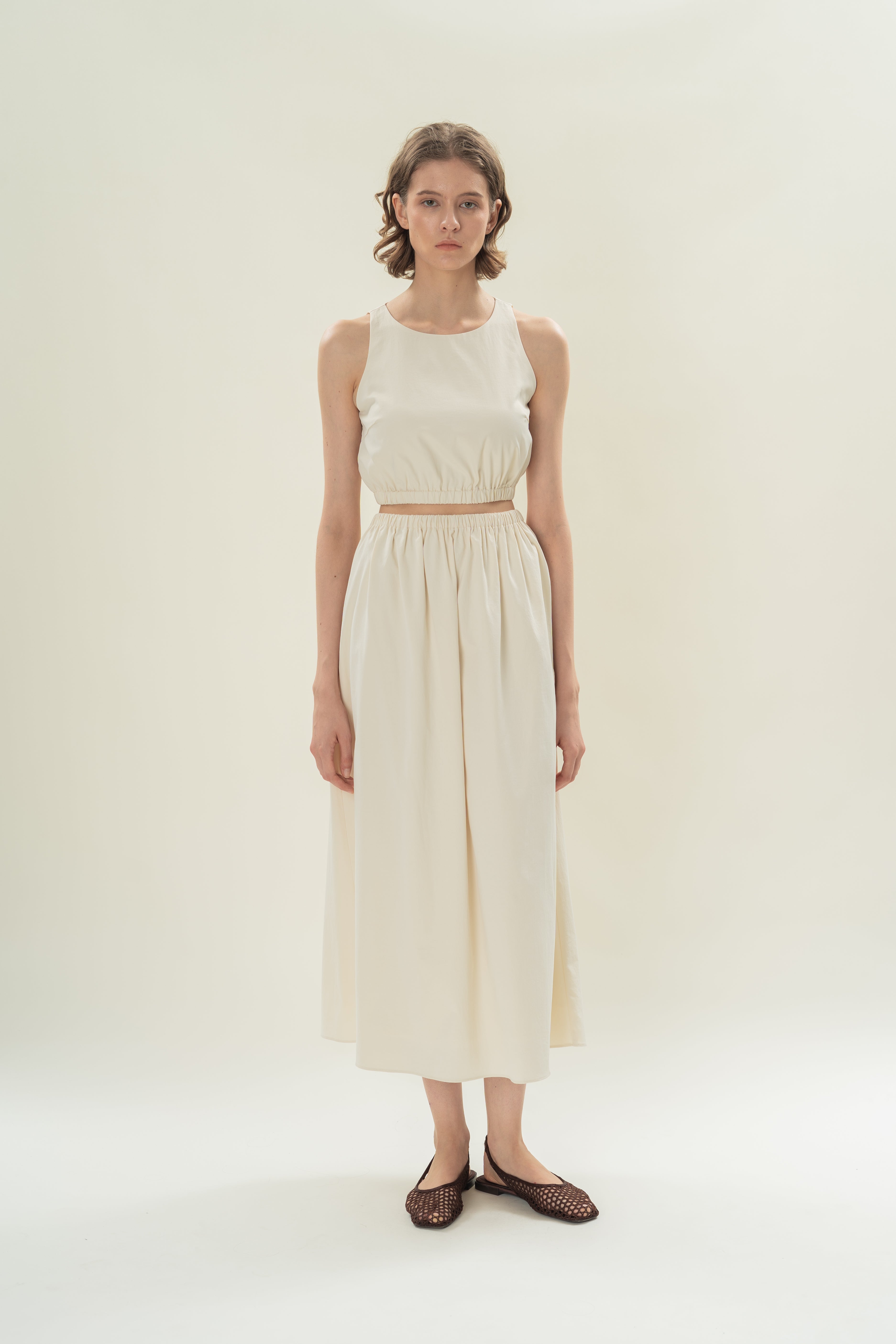 Sleeveless Cropped Gathered Waist Top in Natural