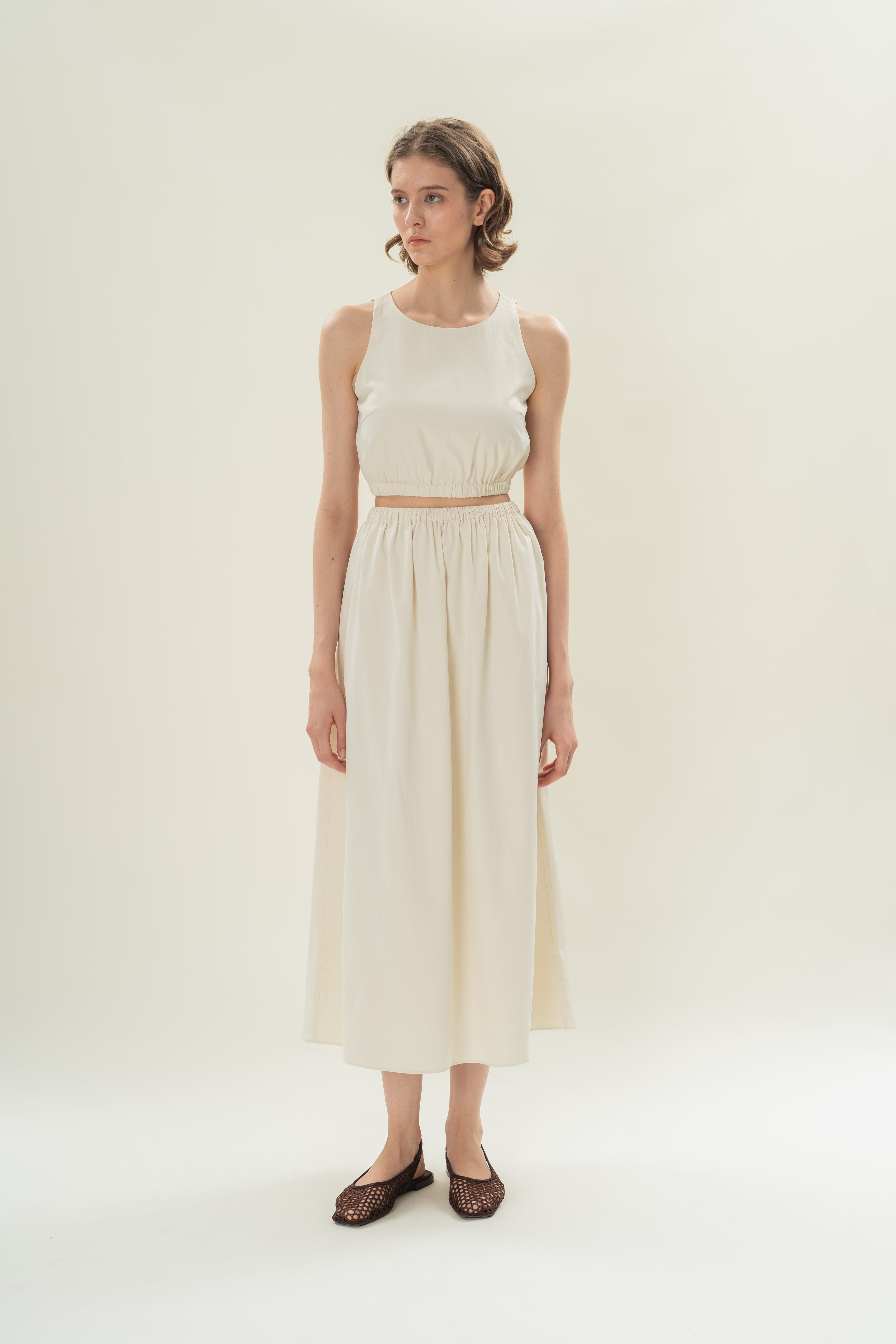 Sleeveless Cropped Gathered Waist Top in Natural