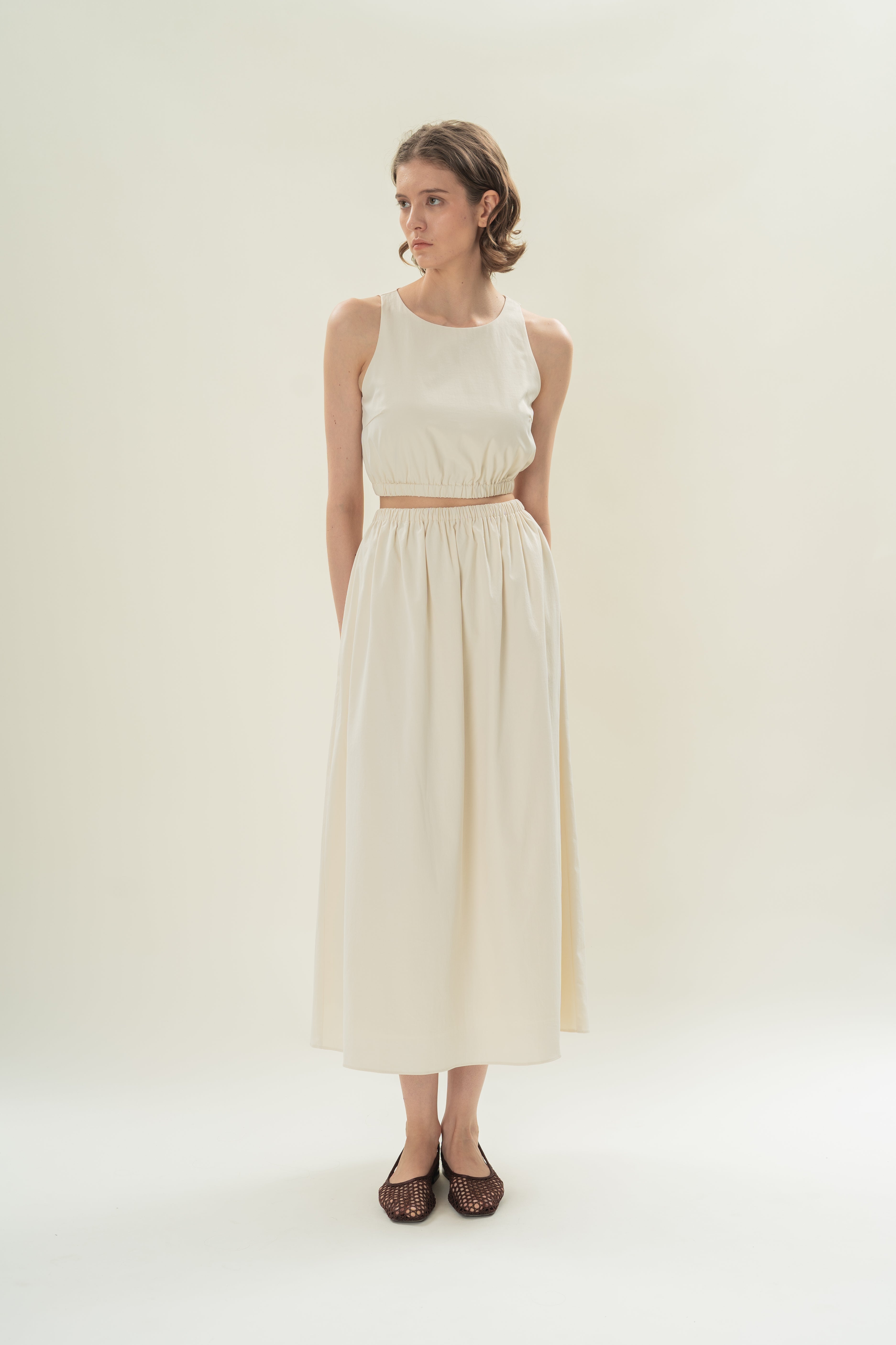 Sleeveless Cropped Gathered Waist Top in Natural