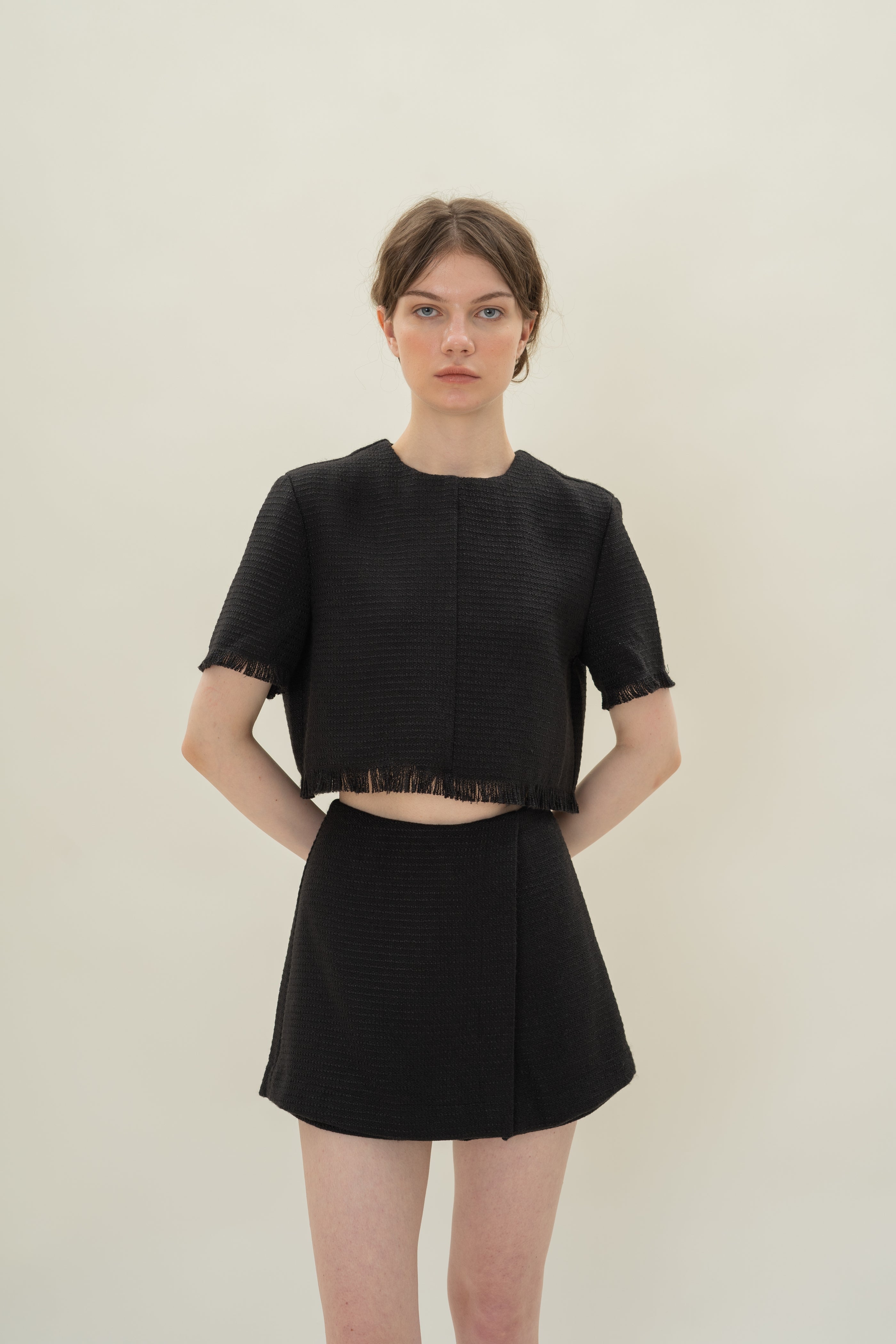 Frayed Hem Textured Short Sleeved Top in Tweed Black