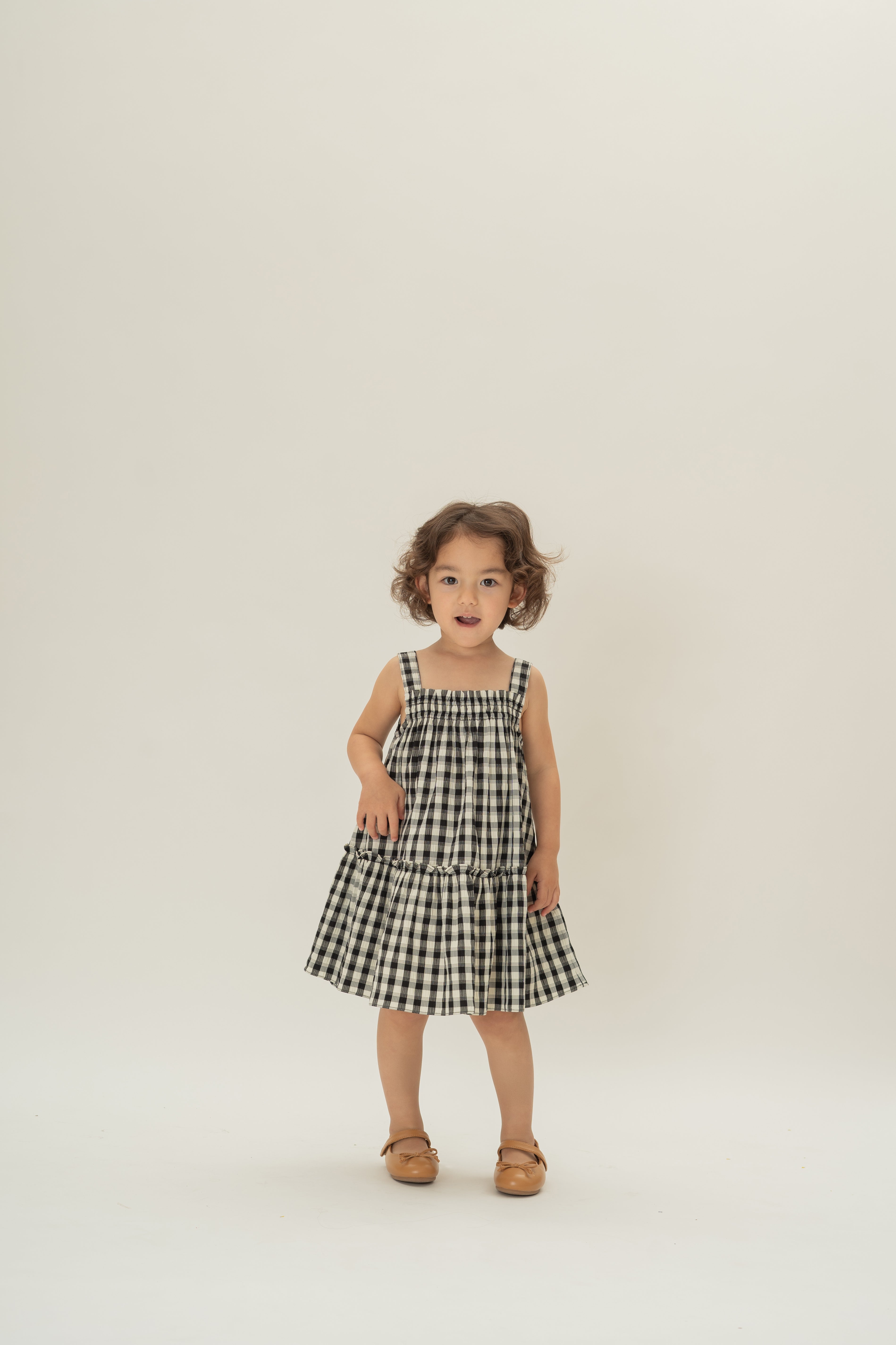 Mini Frilled Tiered Dress in Black Gingham