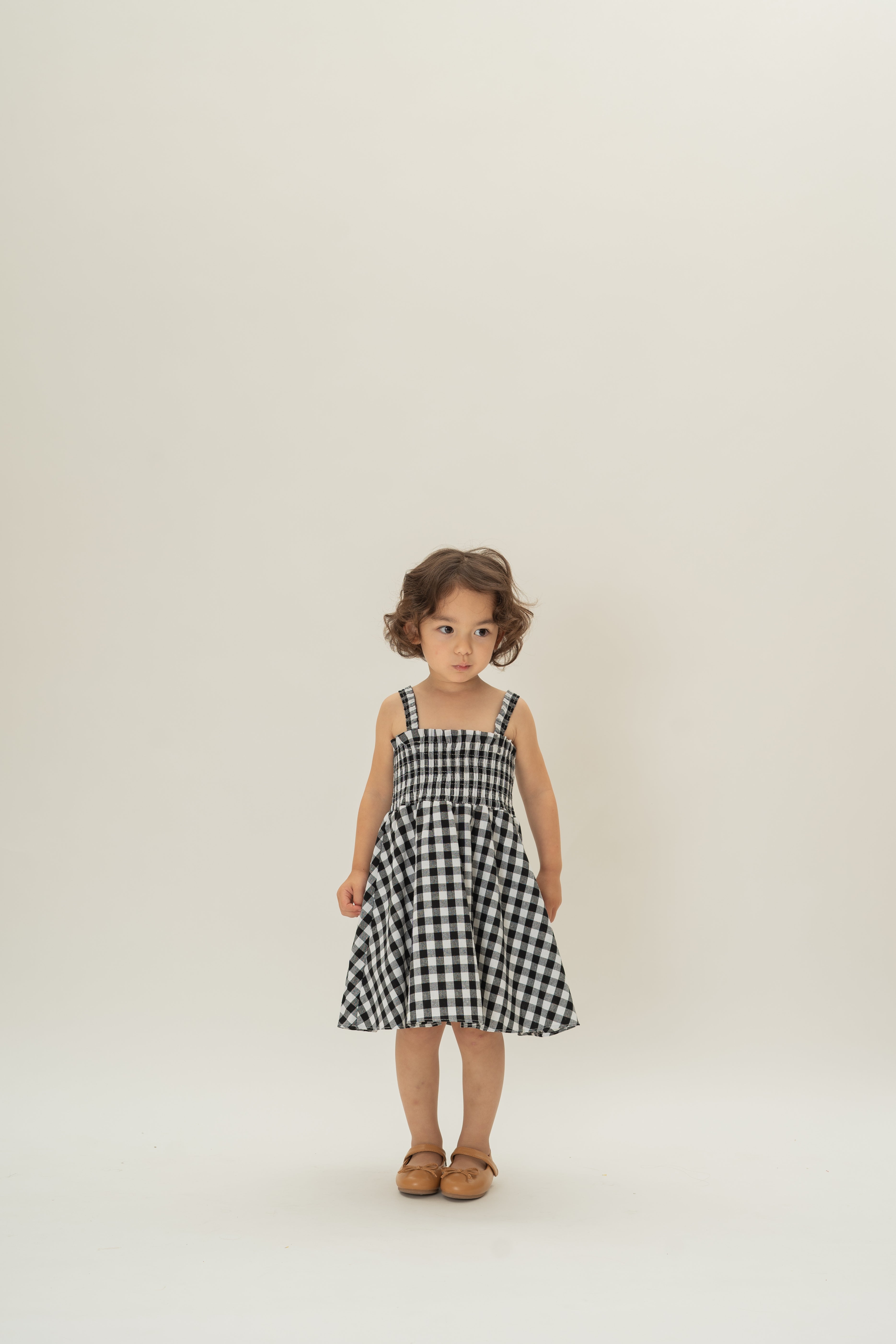 Mini Smocked Dress in Black Gingham