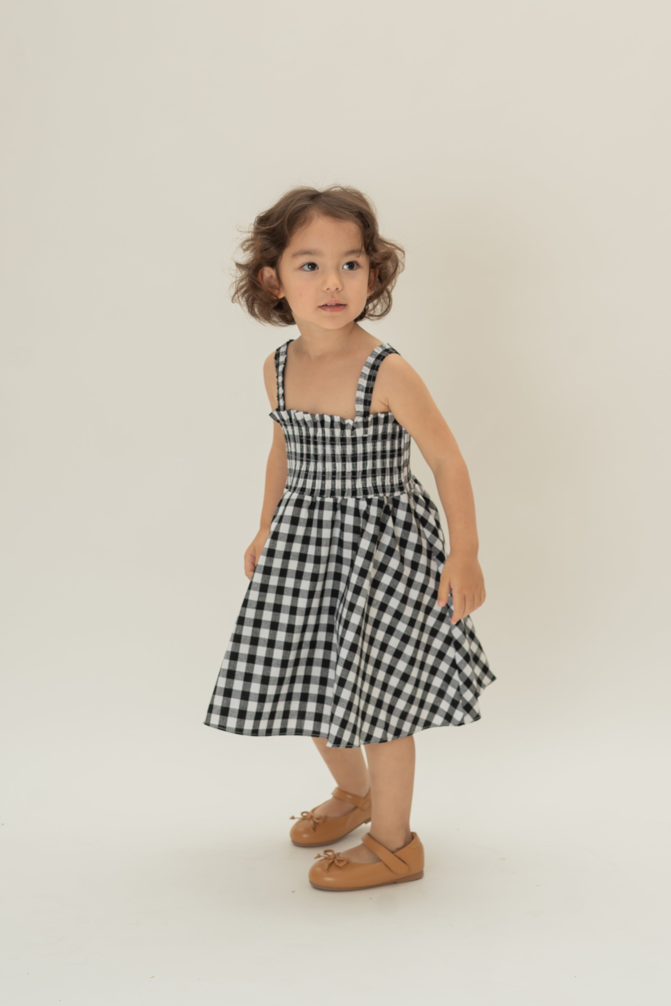 Mini Smocked Dress in Black Gingham