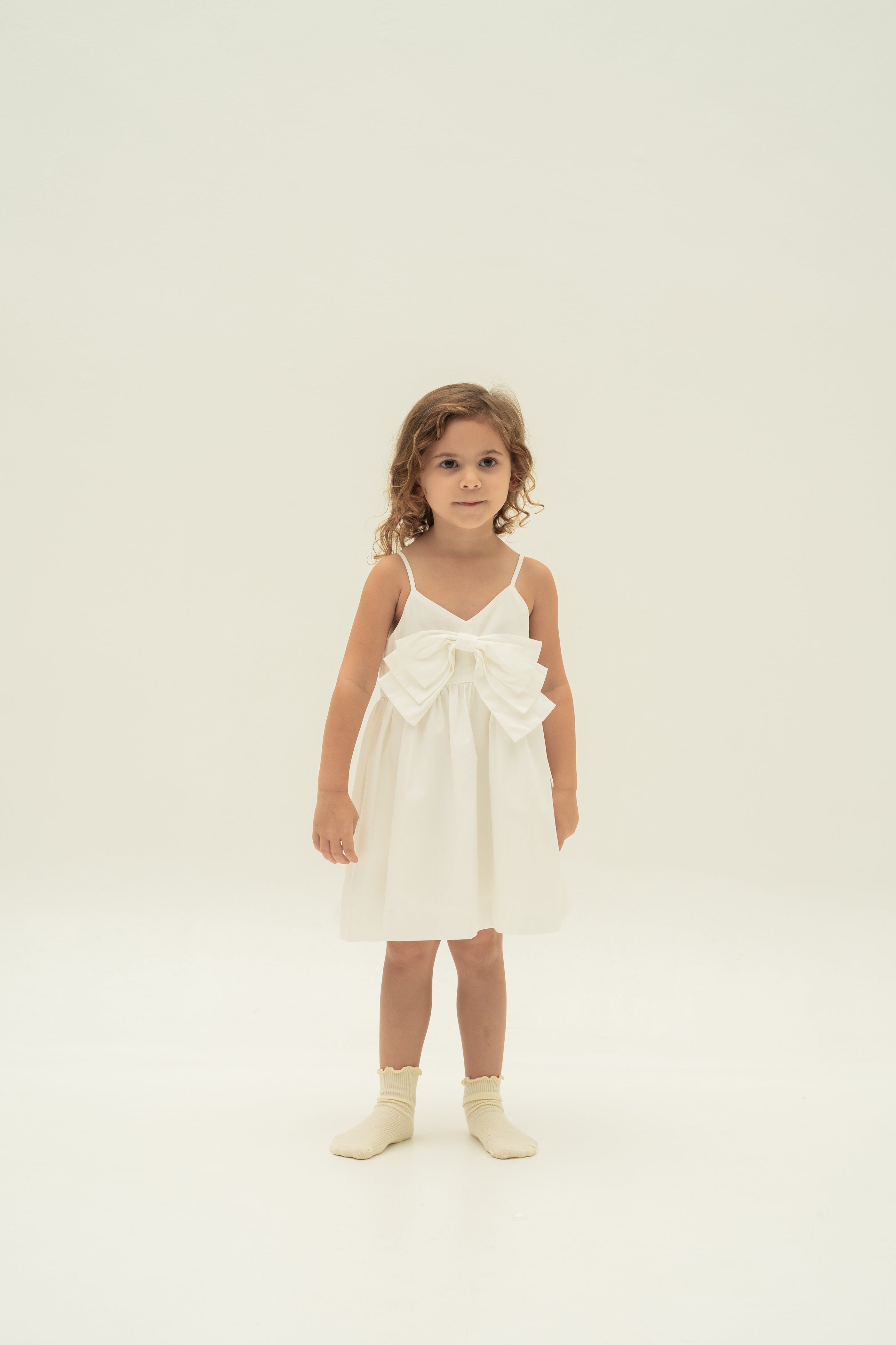 Mini Sleeveless Dress With Detachable Bow in White