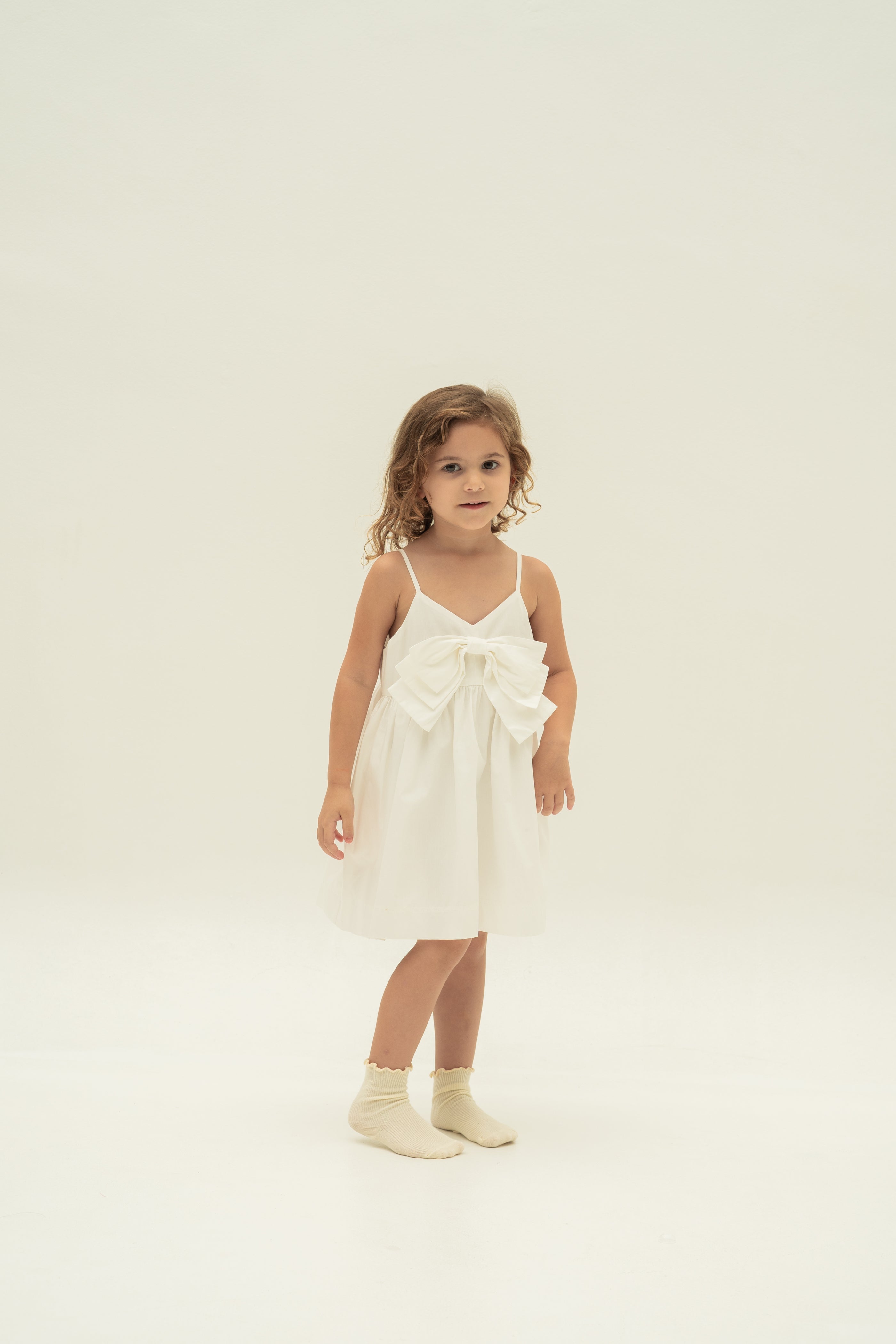 Mini Sleeveless Dress With Detachable Bow in White