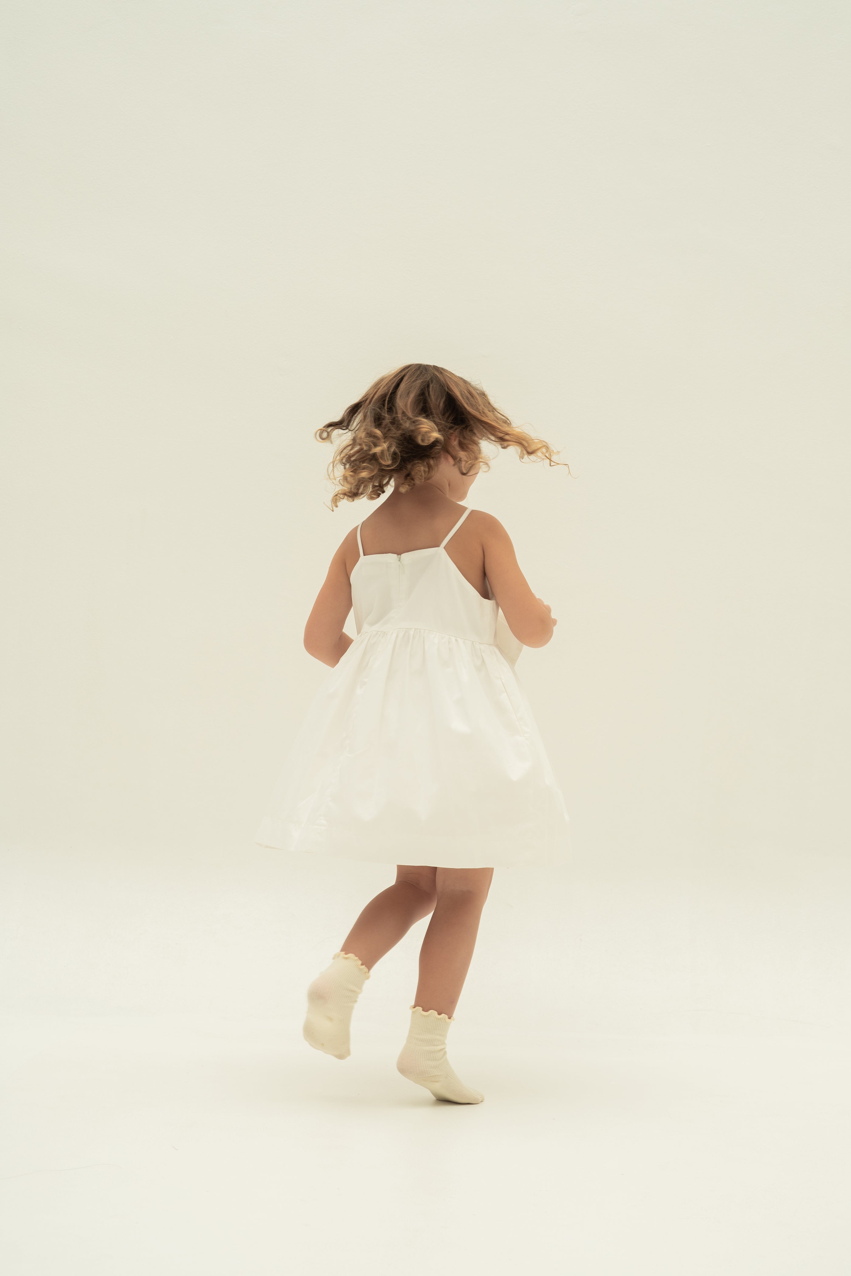 Mini Sleeveless Dress With Detachable Bow in White