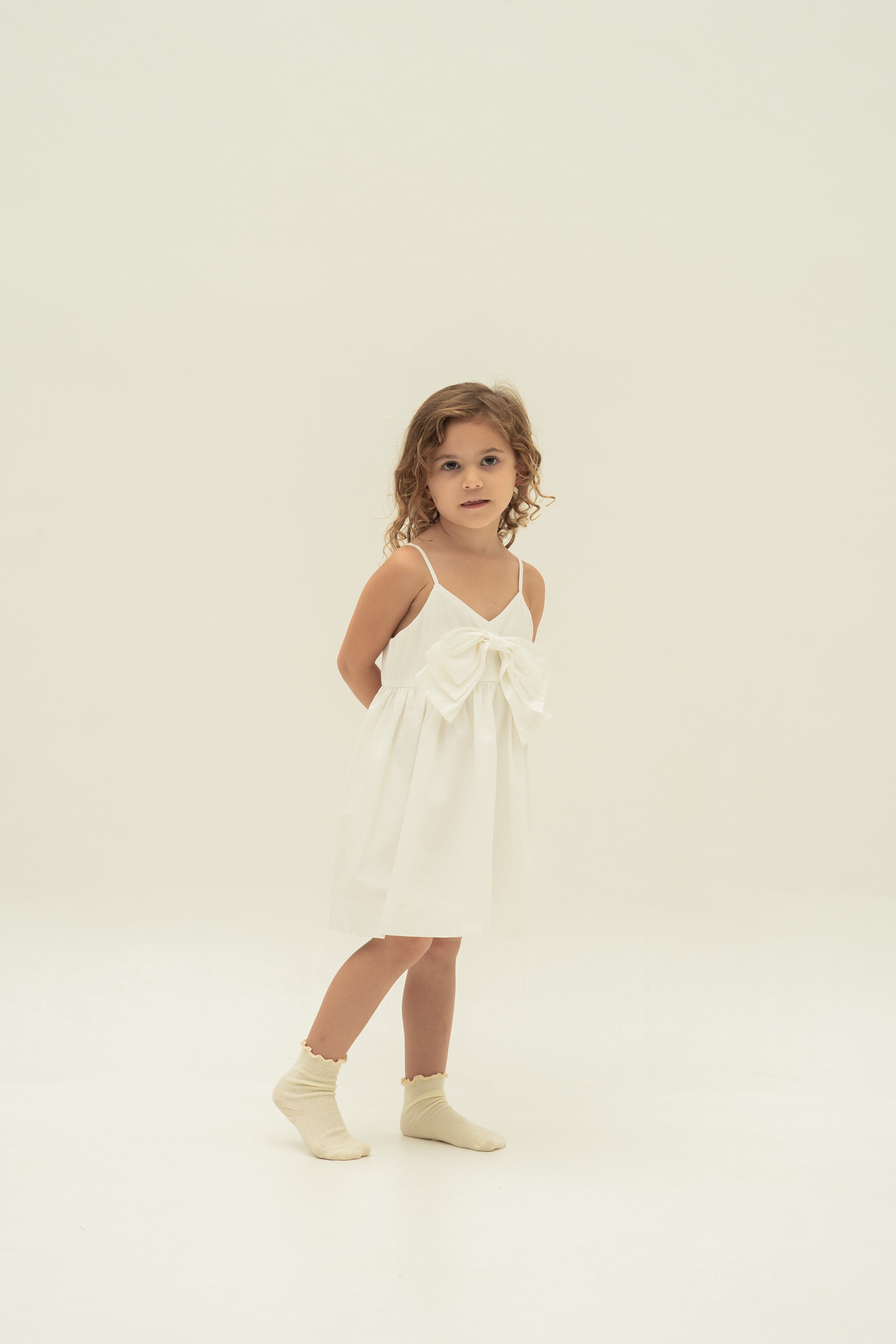 Mini Sleeveless Dress With Detachable Bow in White