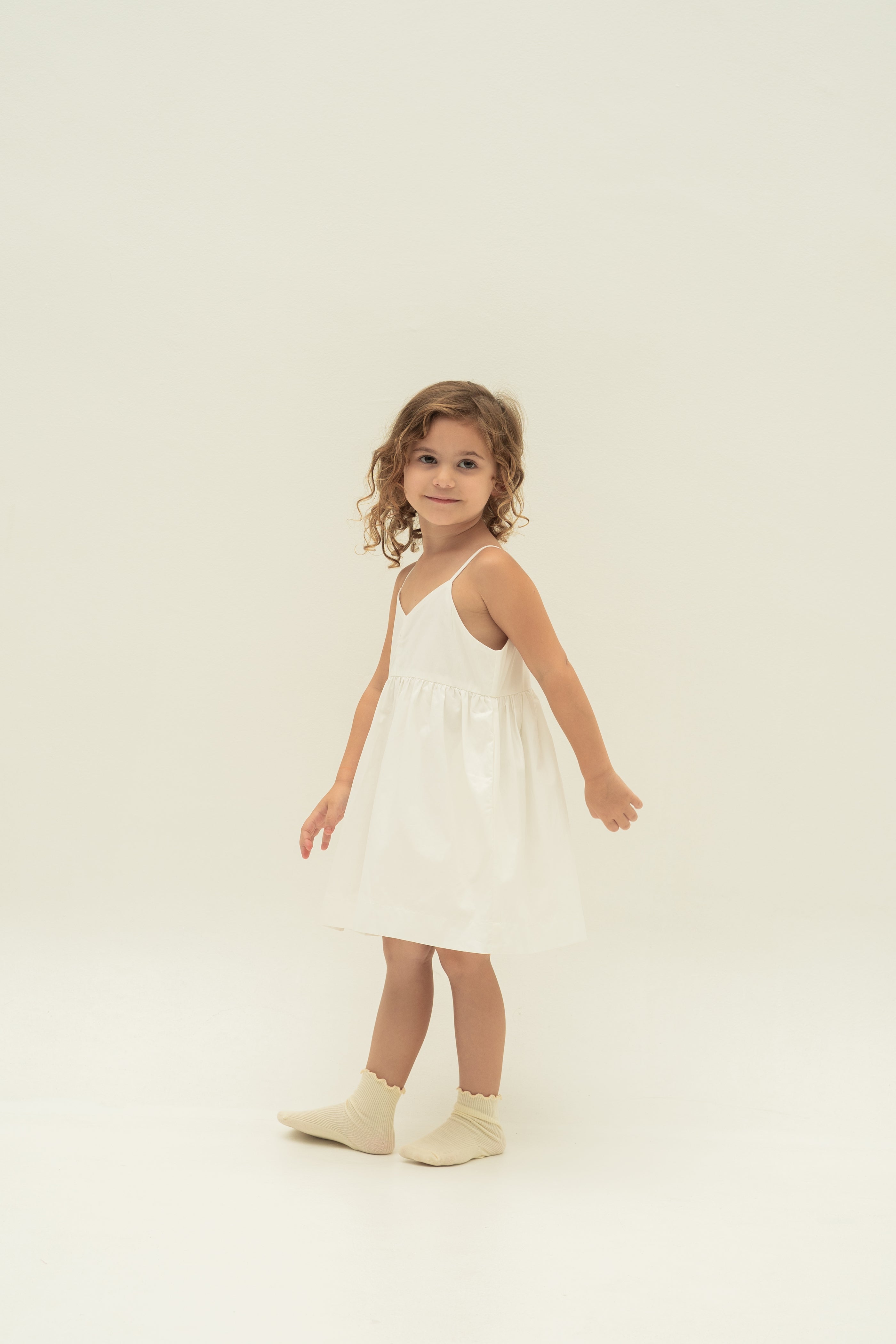 Mini Sleeveless Dress With Detachable Bow in White