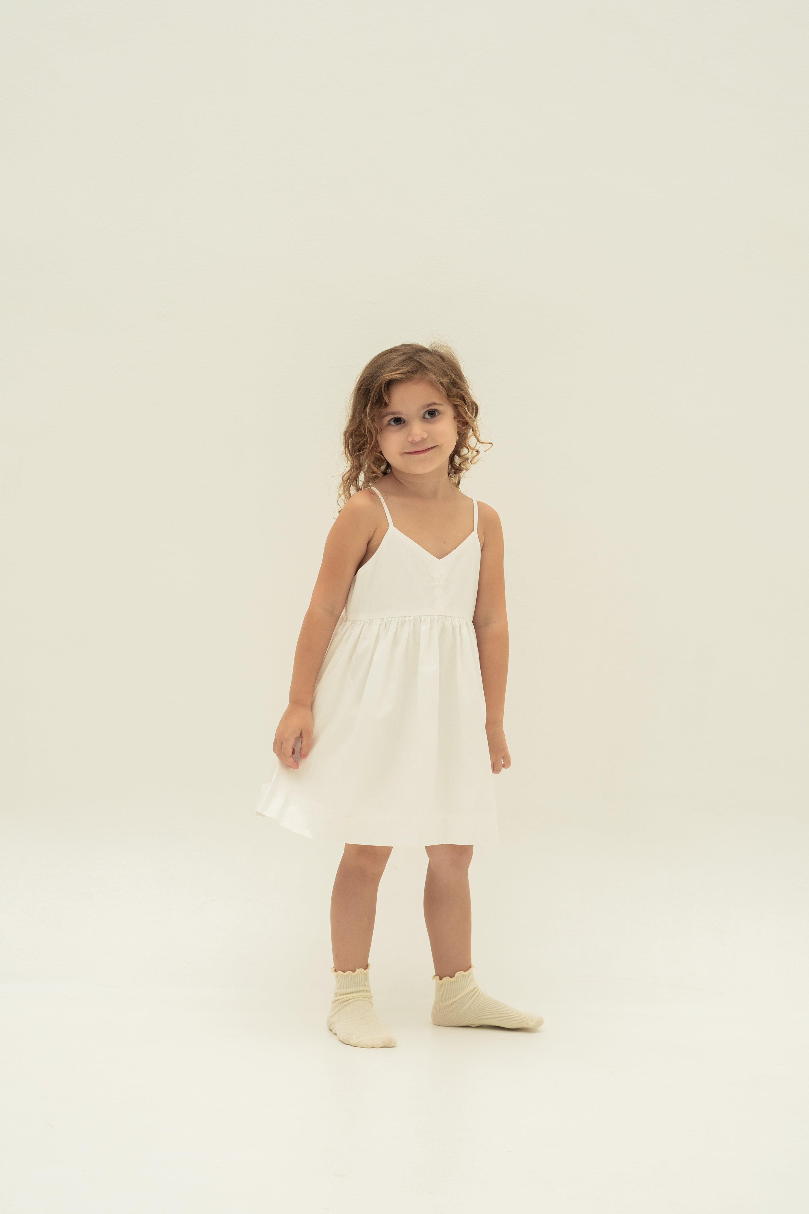 Mini Sleeveless Dress With Detachable Bow in White