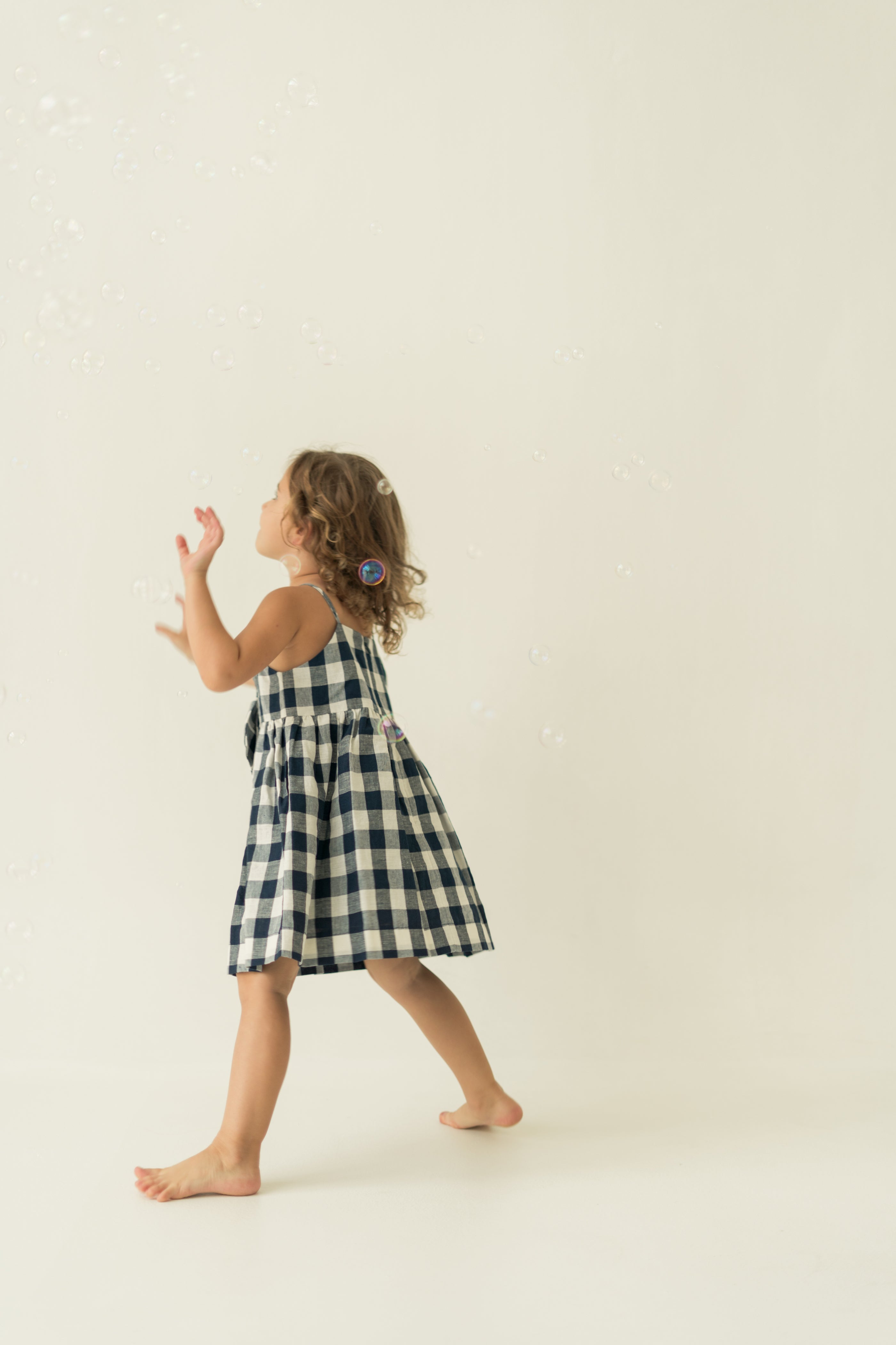 Mini Sleeveless Dress With Detachable Bow in Navy Gingham