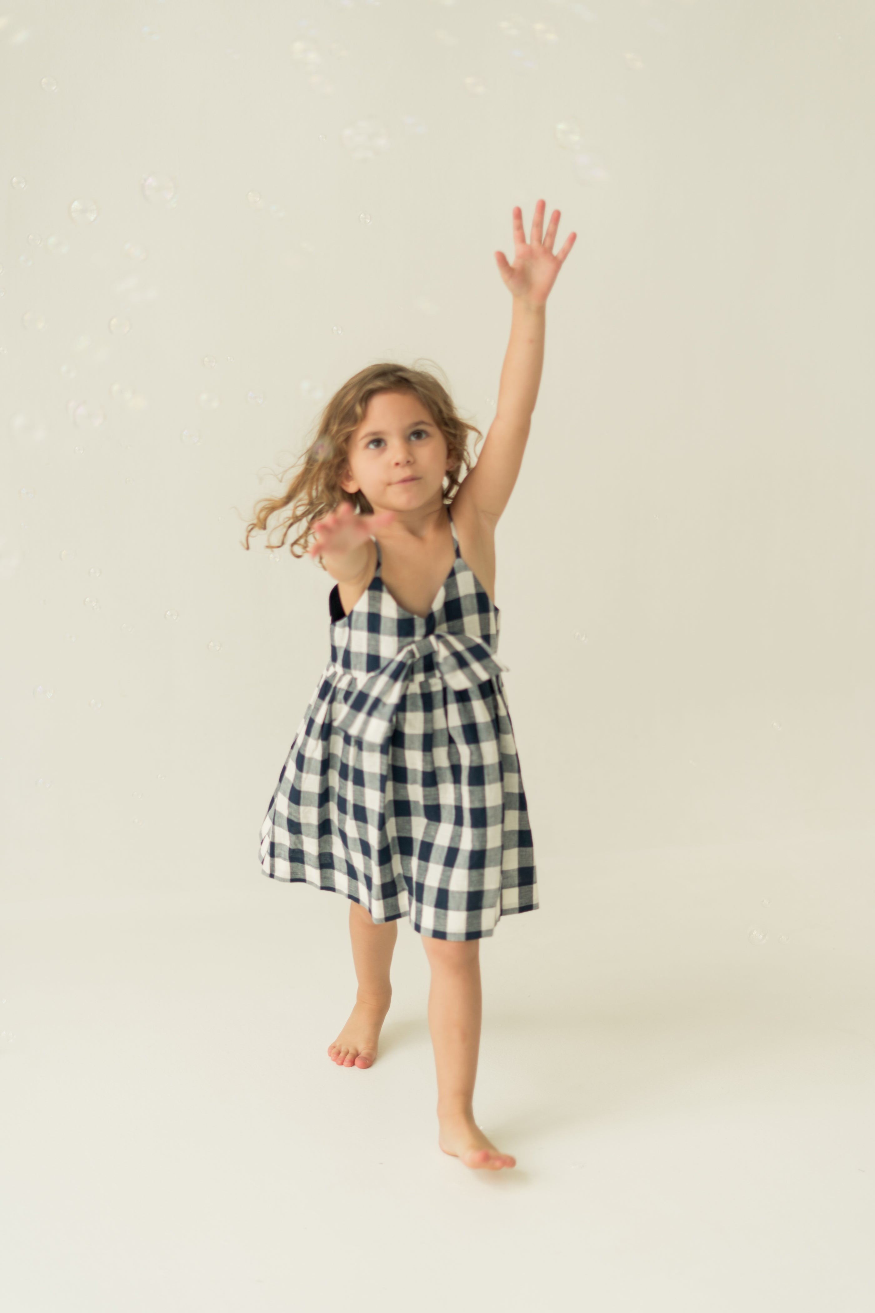 Mini Sleeveless Dress With Detachable Bow in Navy Gingham