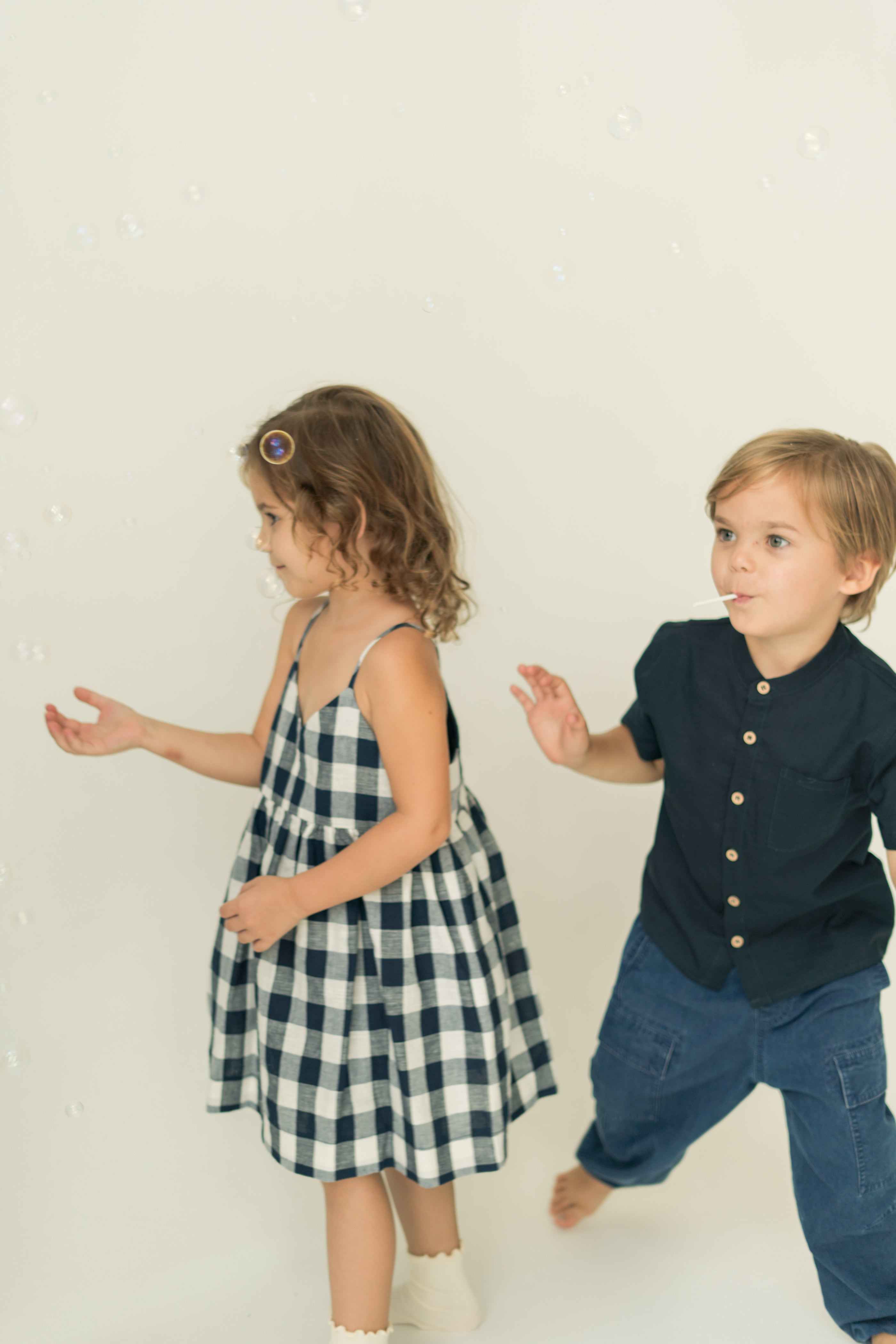 Mini Sleeveless Dress With Detachable Bow in Navy Gingham