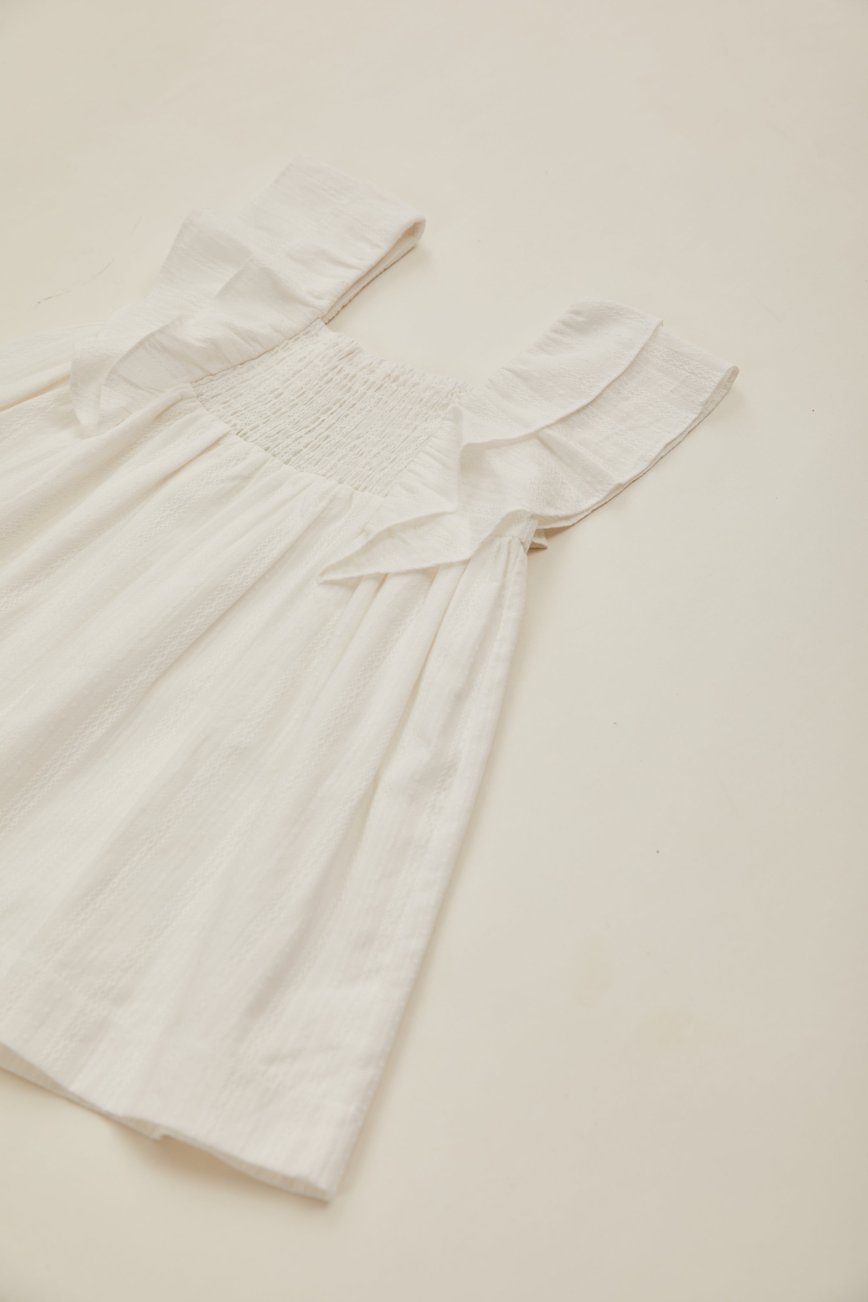 Mini Flutter Strap Shirred Dress in White