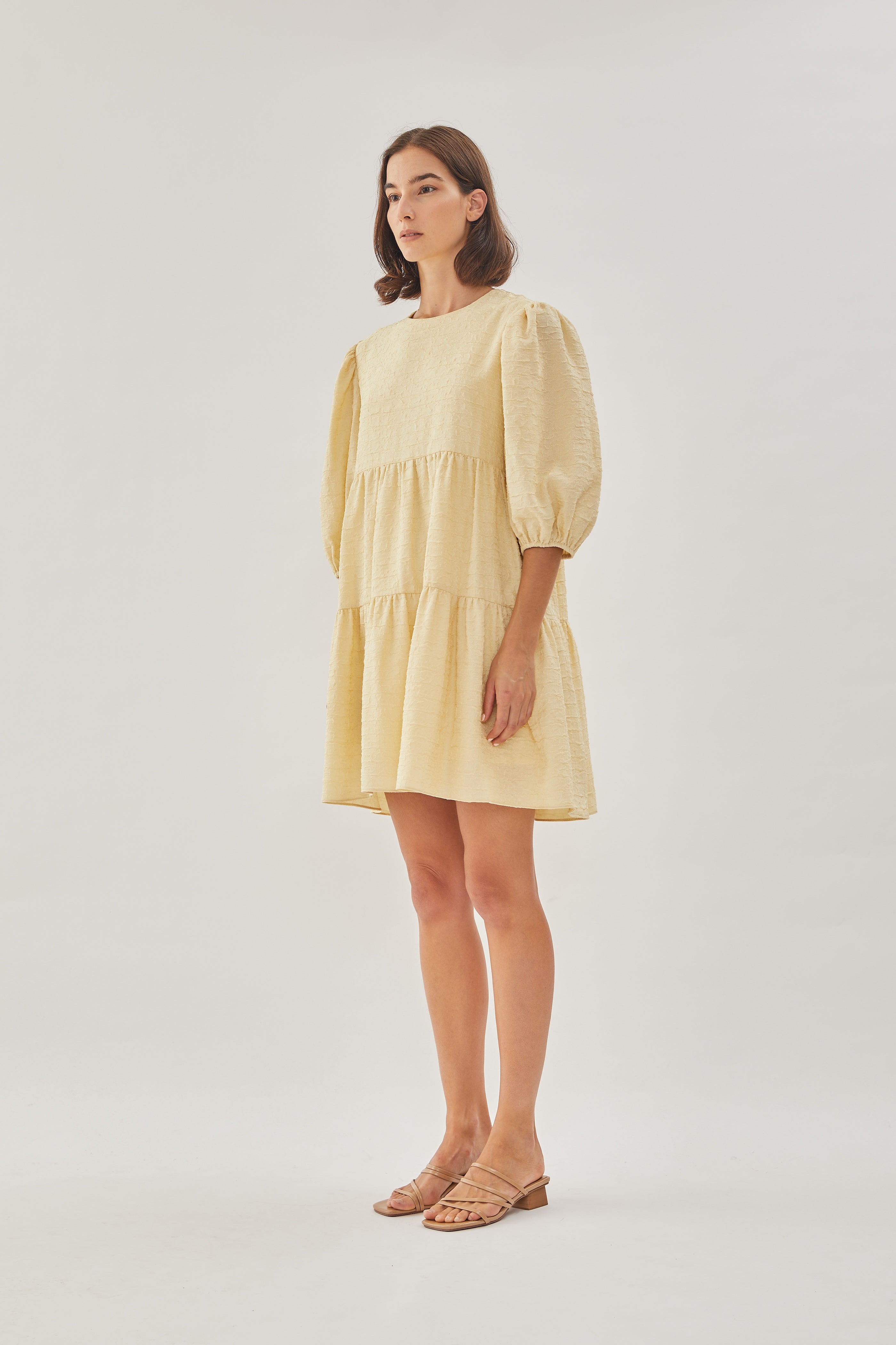 Textured Puffed Sleeved Mini Dress in Yellow