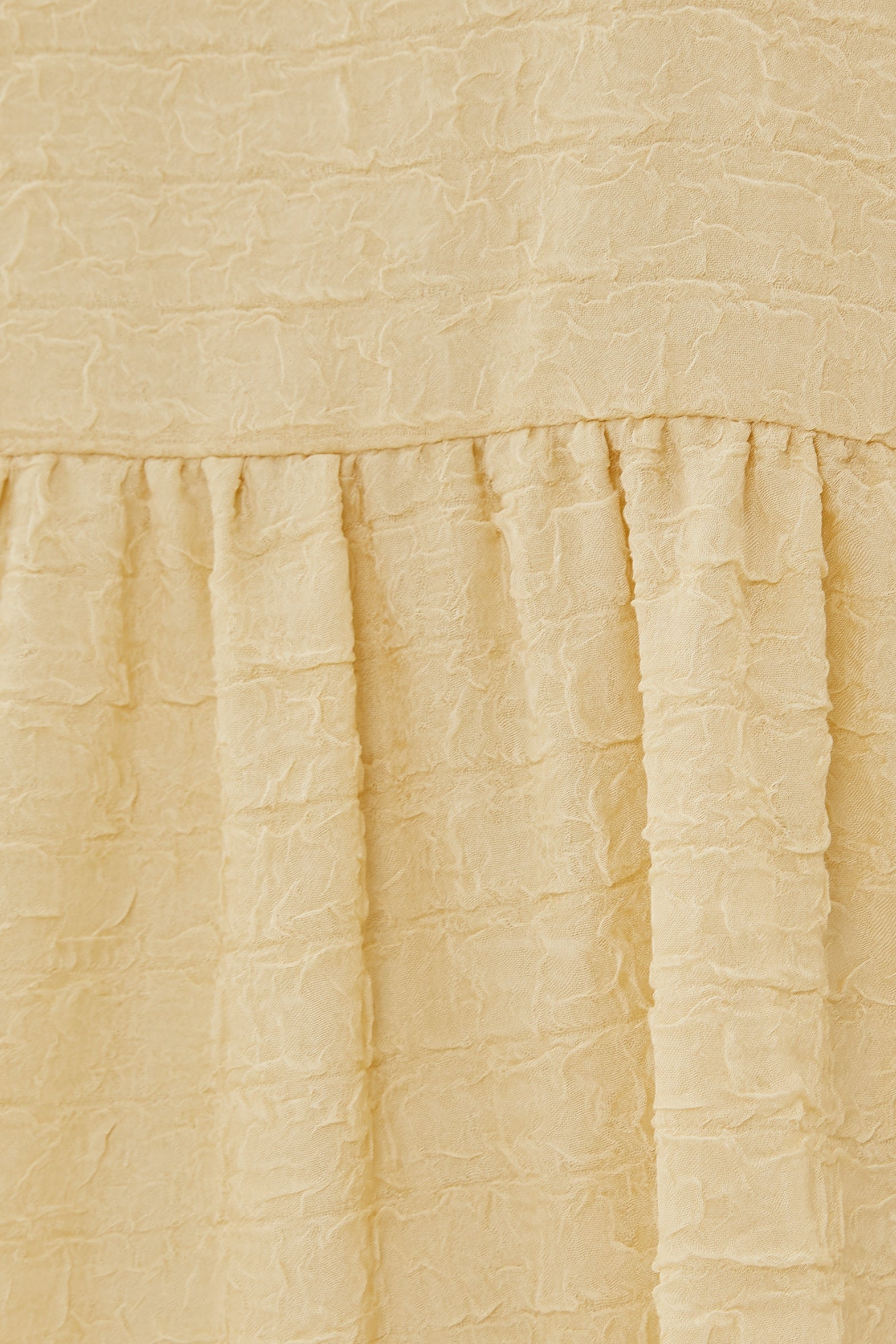 Textured Puffed Sleeved Mini Dress in Yellow