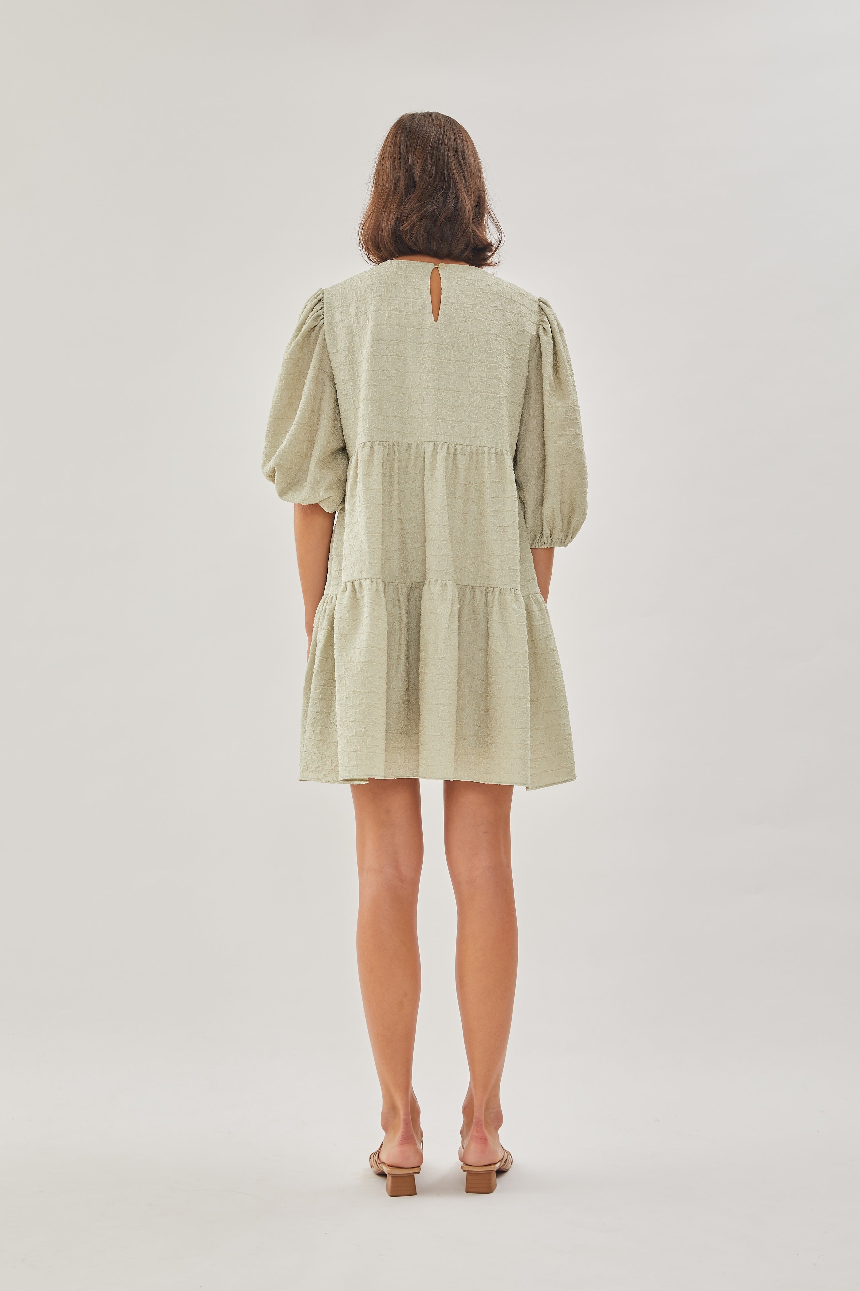 Textured Puffed Sleeved Mini Dress in Sea Mist