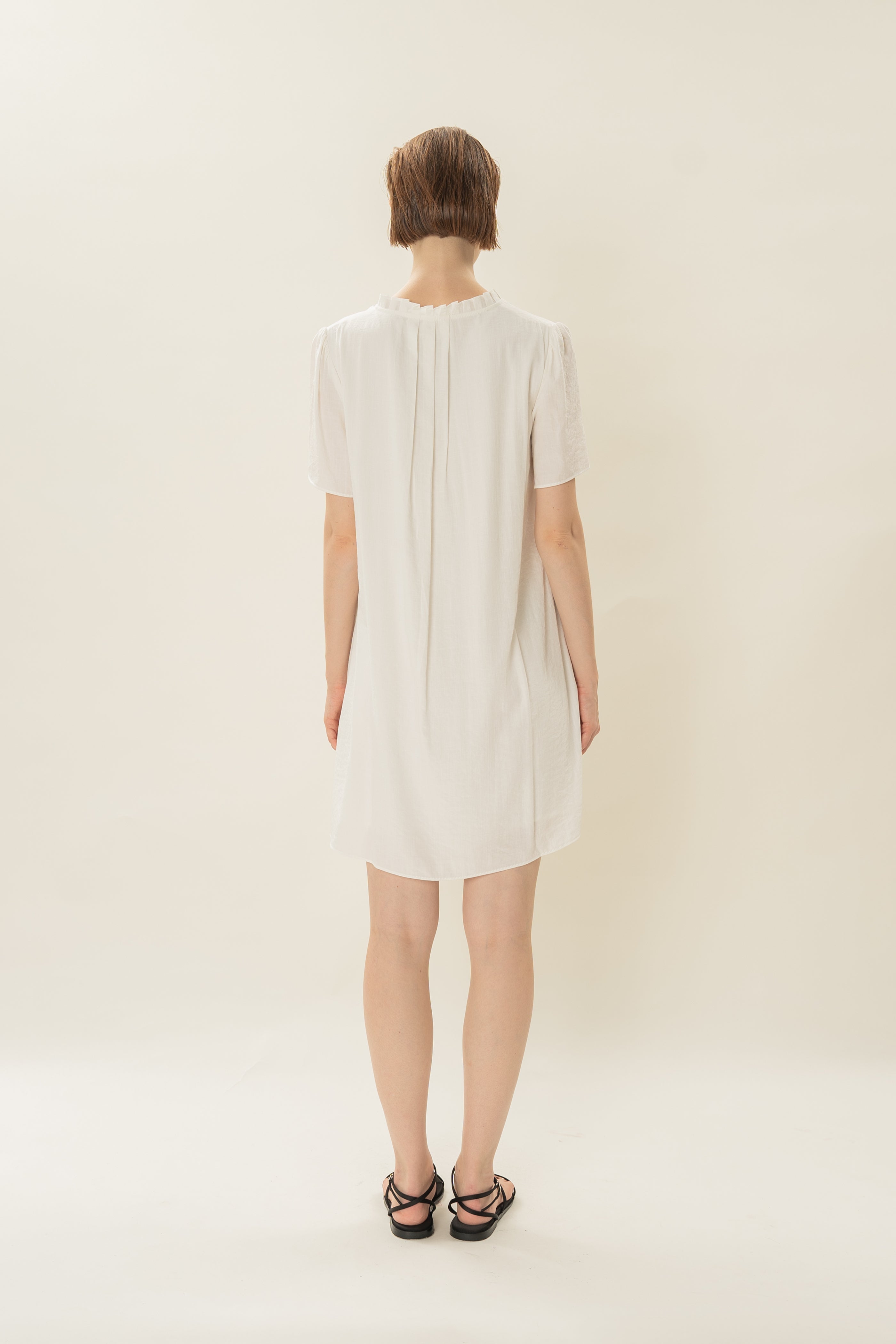 Pleated V Neck Dress in White