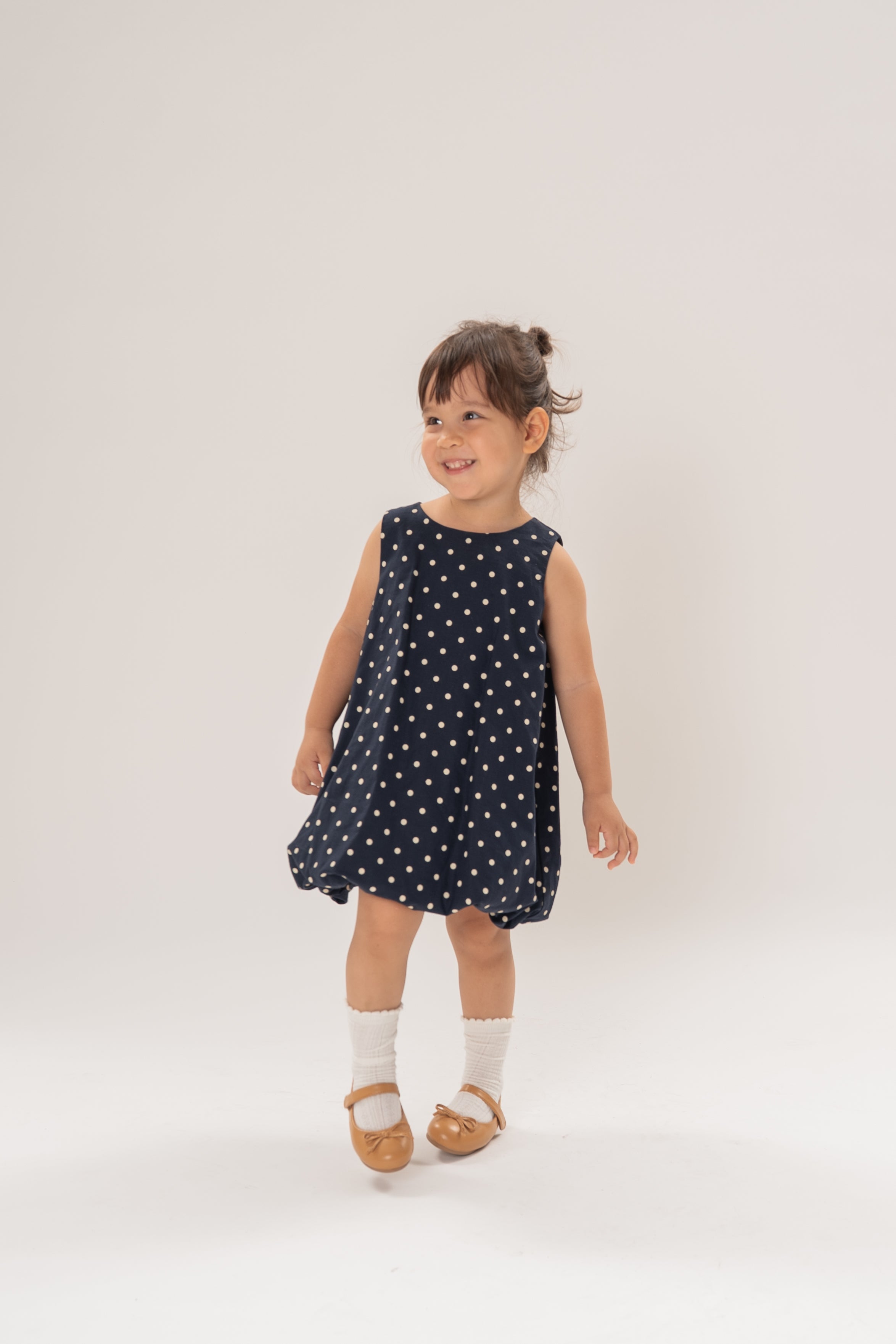 Mini Bubble Hem A-Line Dress in Polka Dot Navy