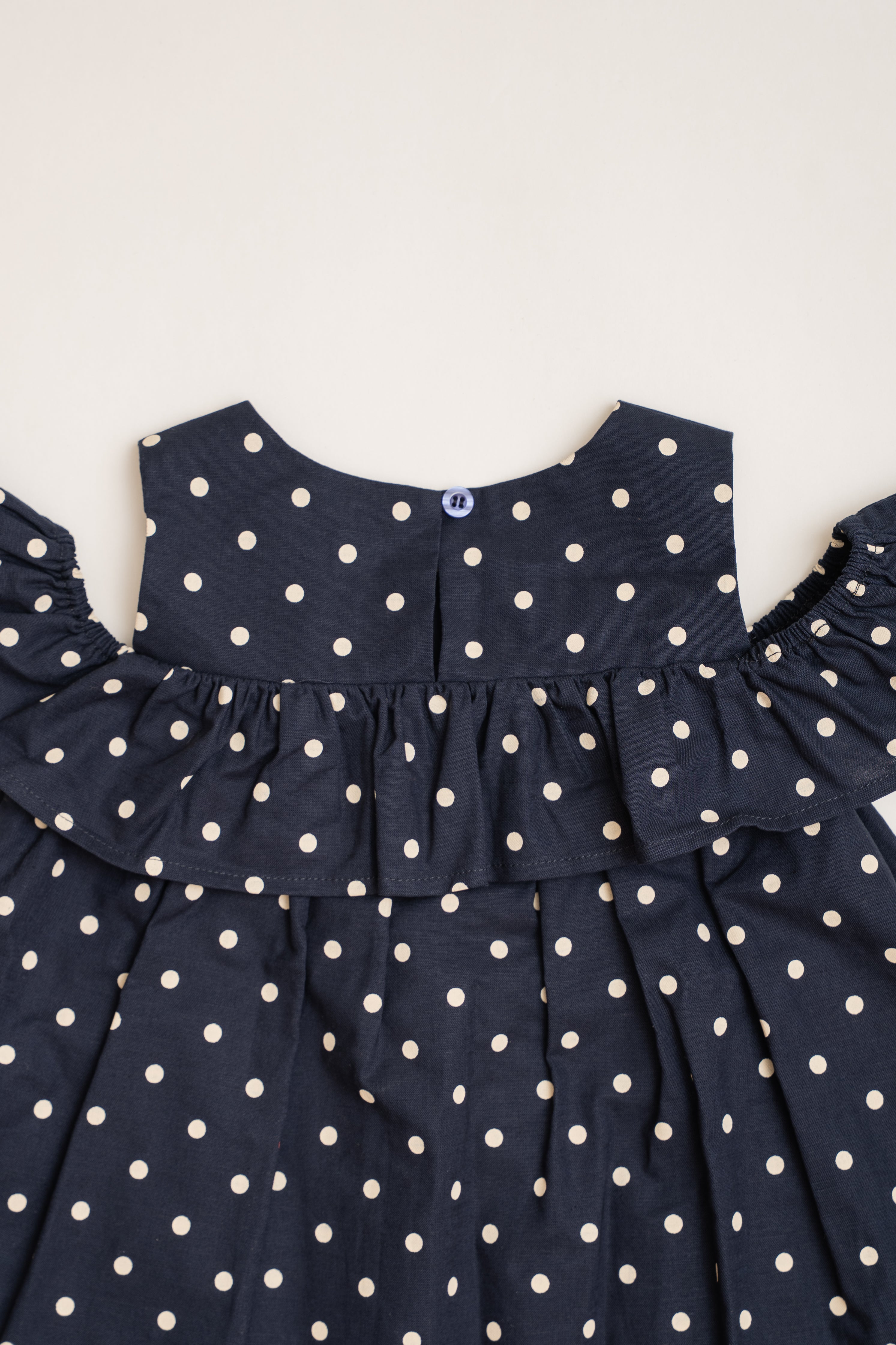Mini Gathered Dress With Shoulder Detailing in Polka Dot Navy
