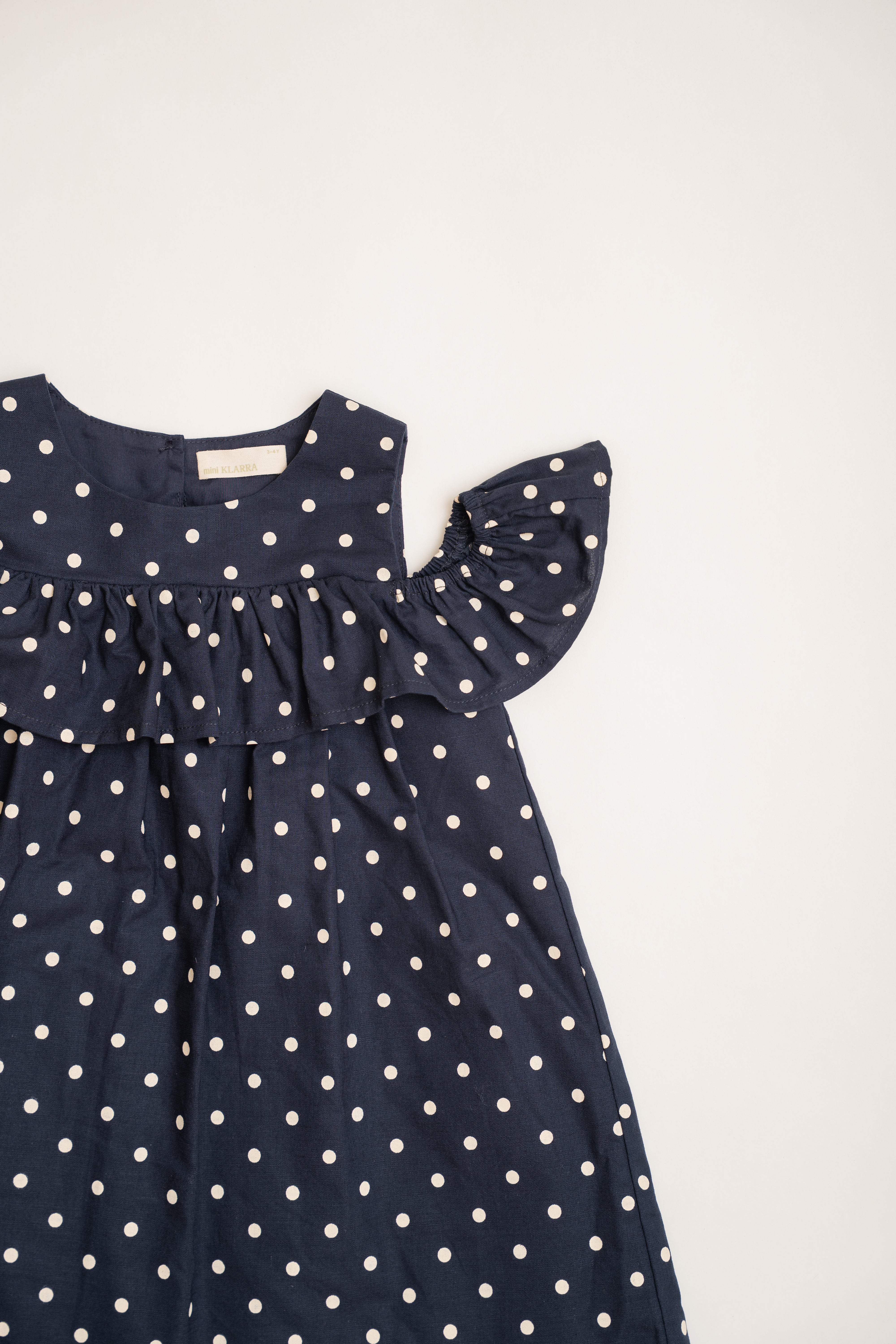 Mini Gathered Dress With Shoulder Detailing in Polka Dot Navy