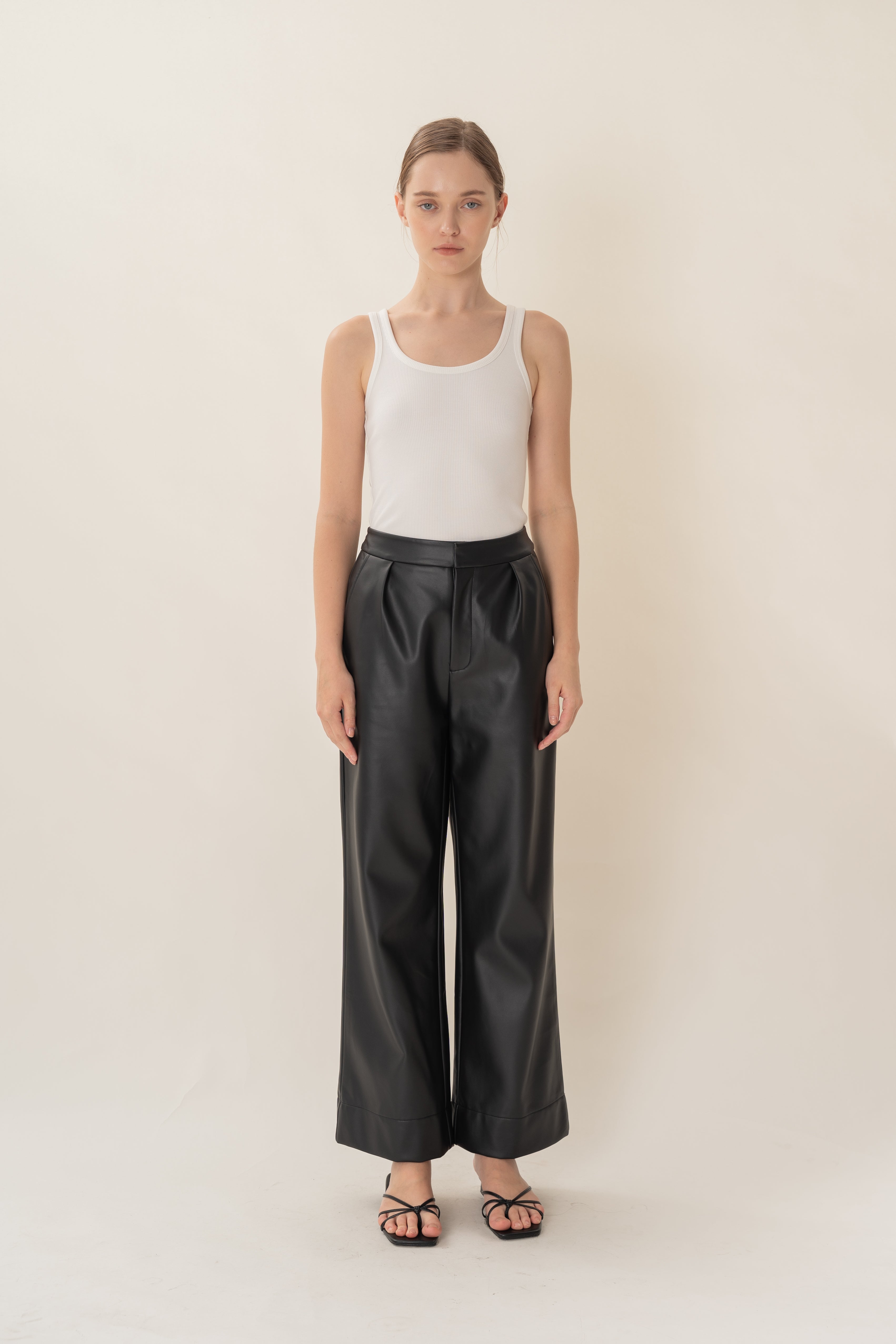 Faux Leather Pleated Trousers in Black
