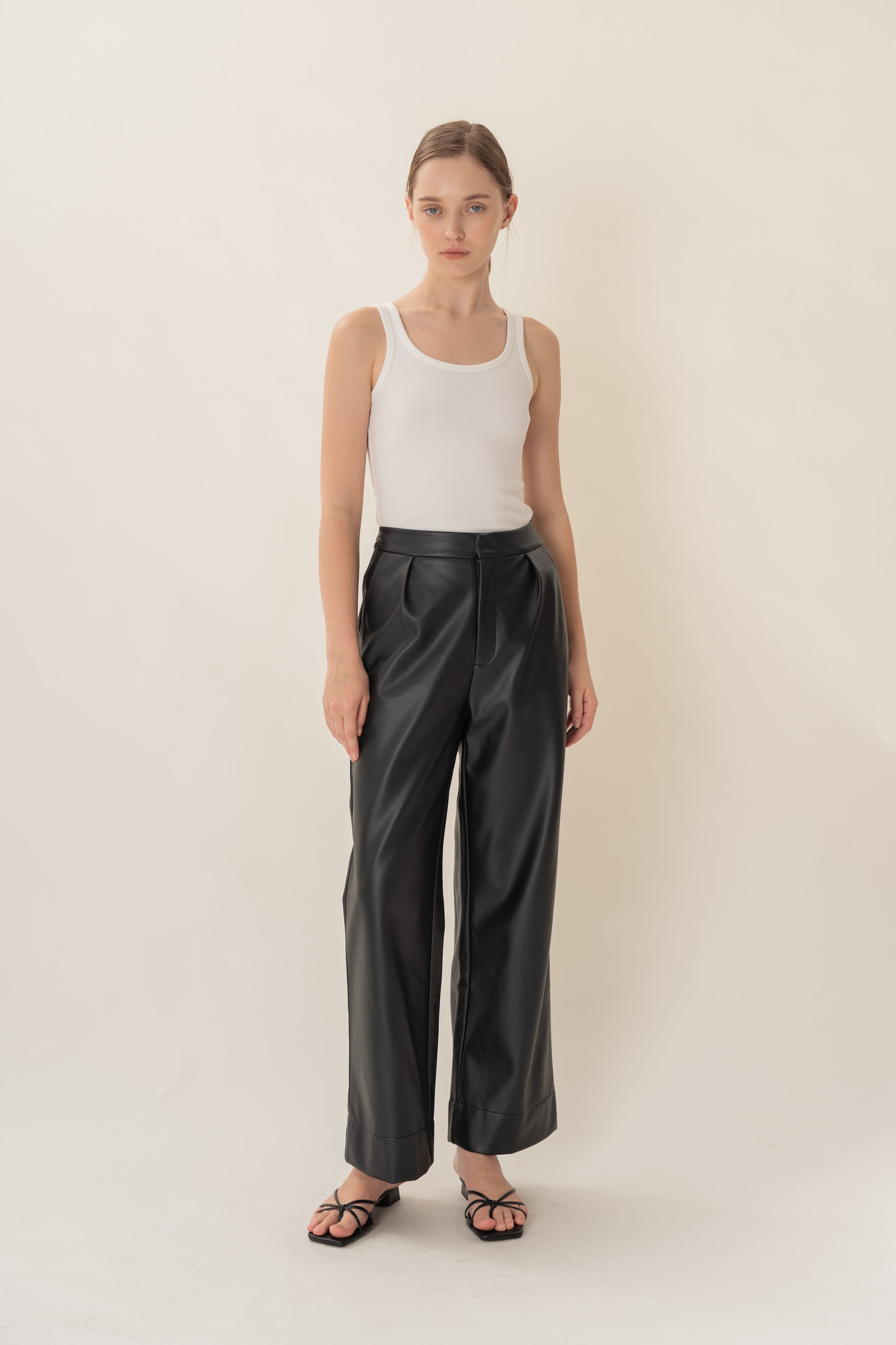 Faux Leather Pleated Trousers in Black
