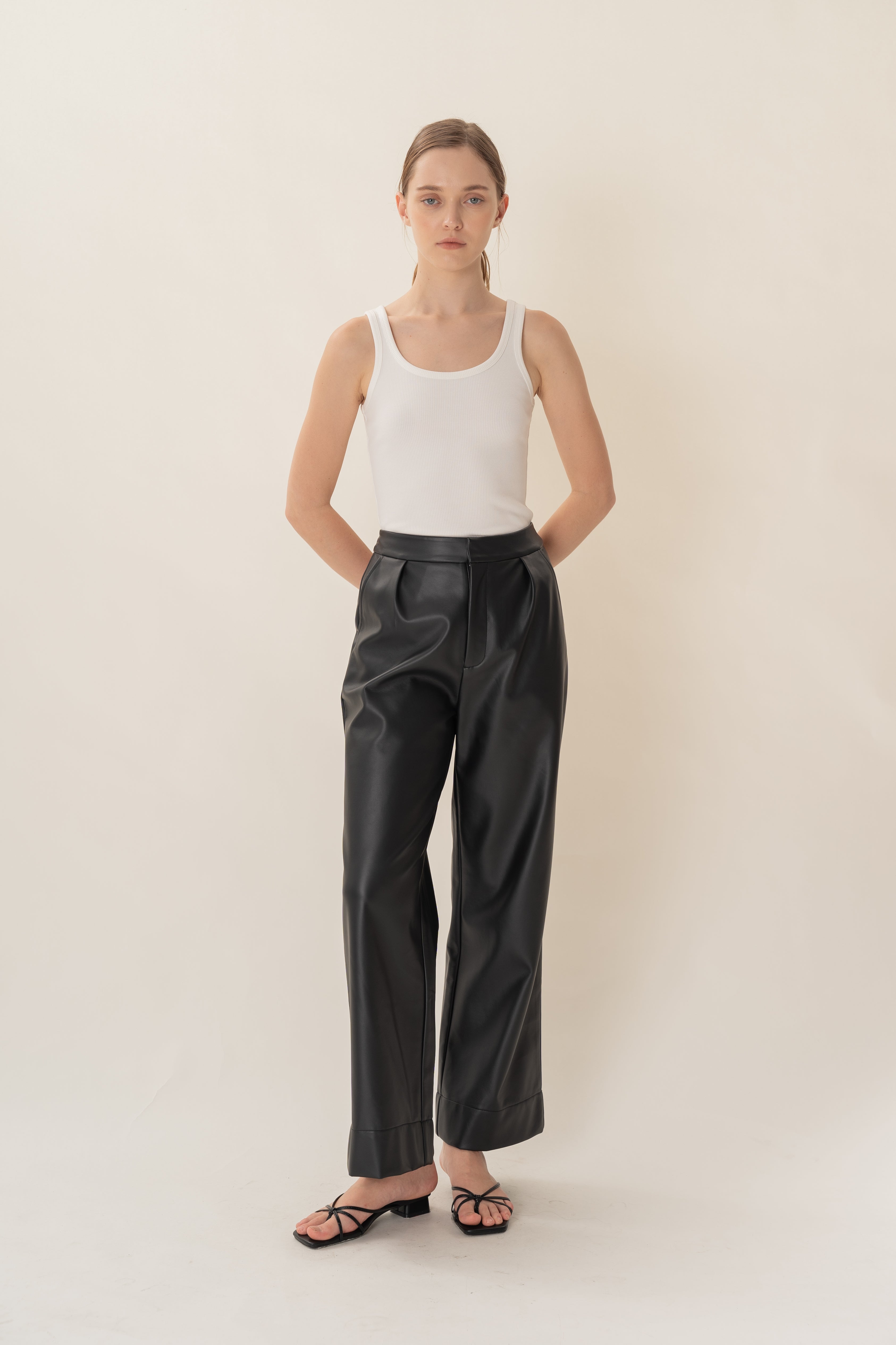 Faux Leather Pleated Trousers in Black