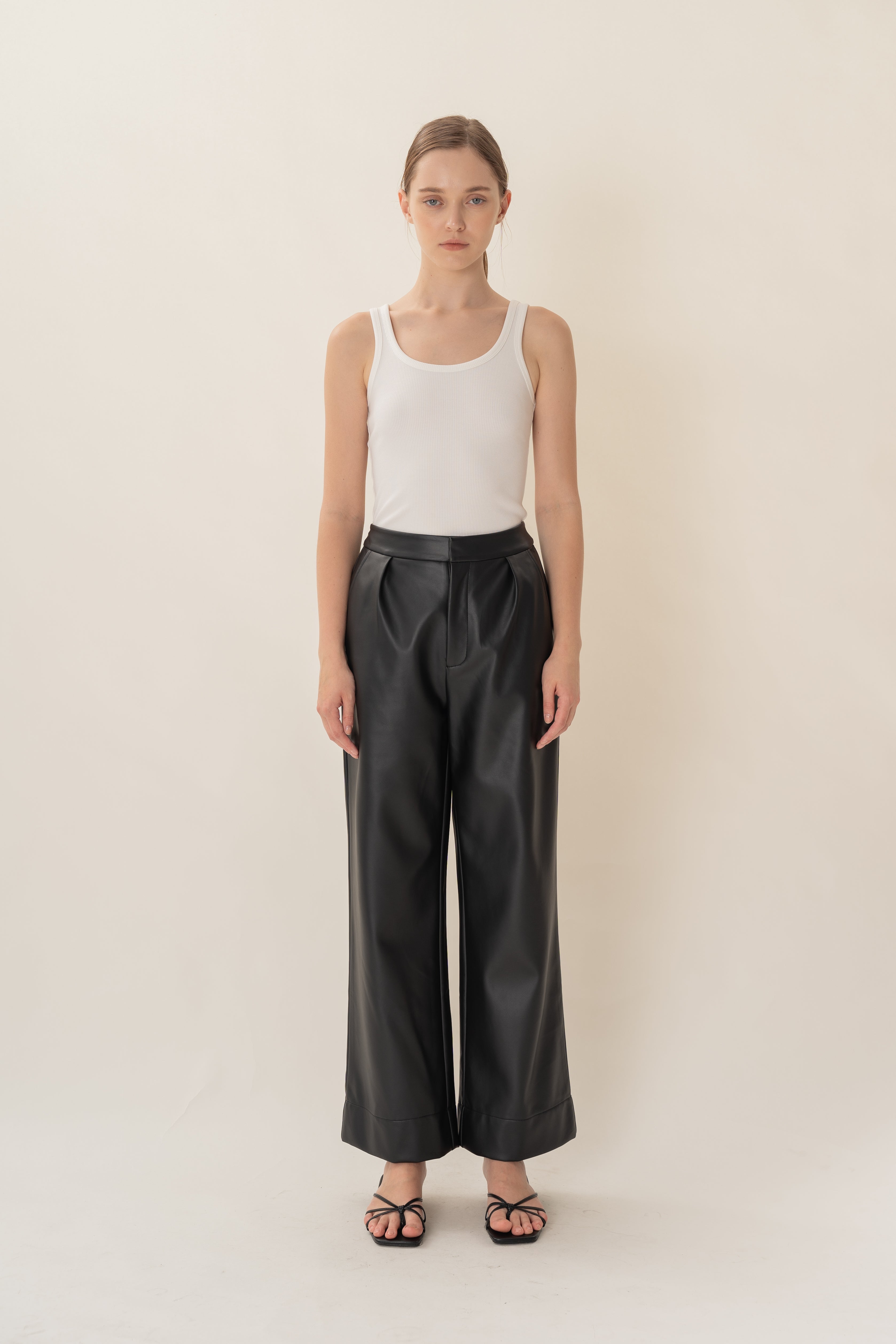 Faux Leather Pleated Trousers in Black