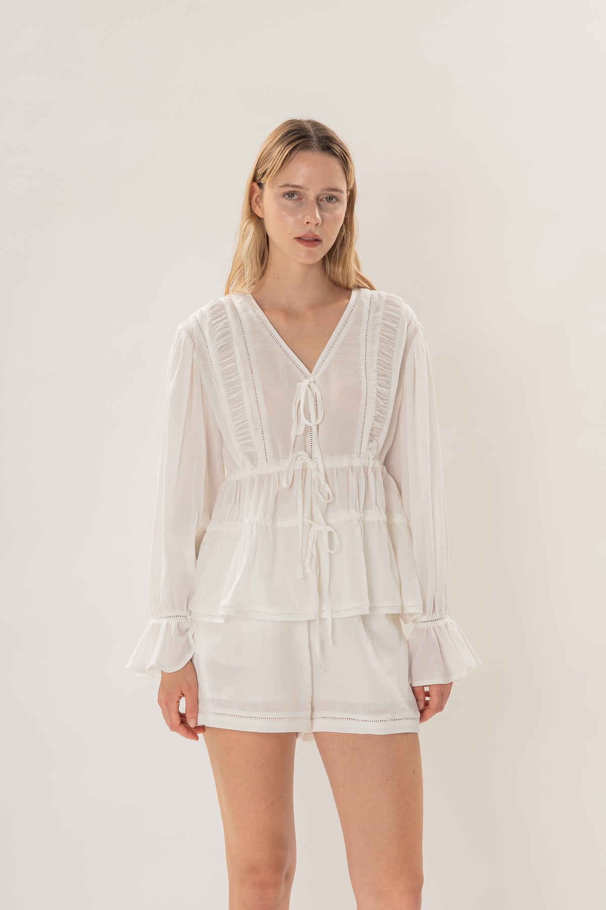 Textured Long Sleeve Blouse With Eyelet Detailing in White